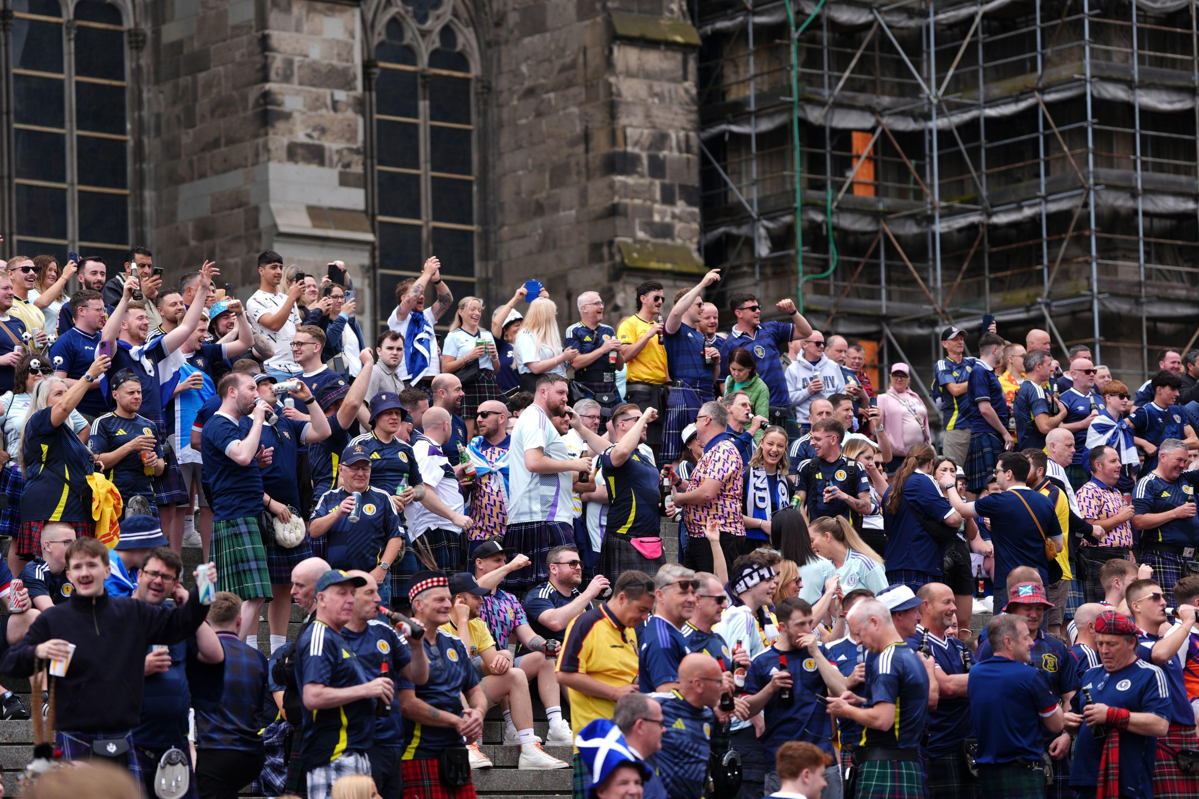 Fans sang on the steps of Cologne Cathedral before the match against Switzerland