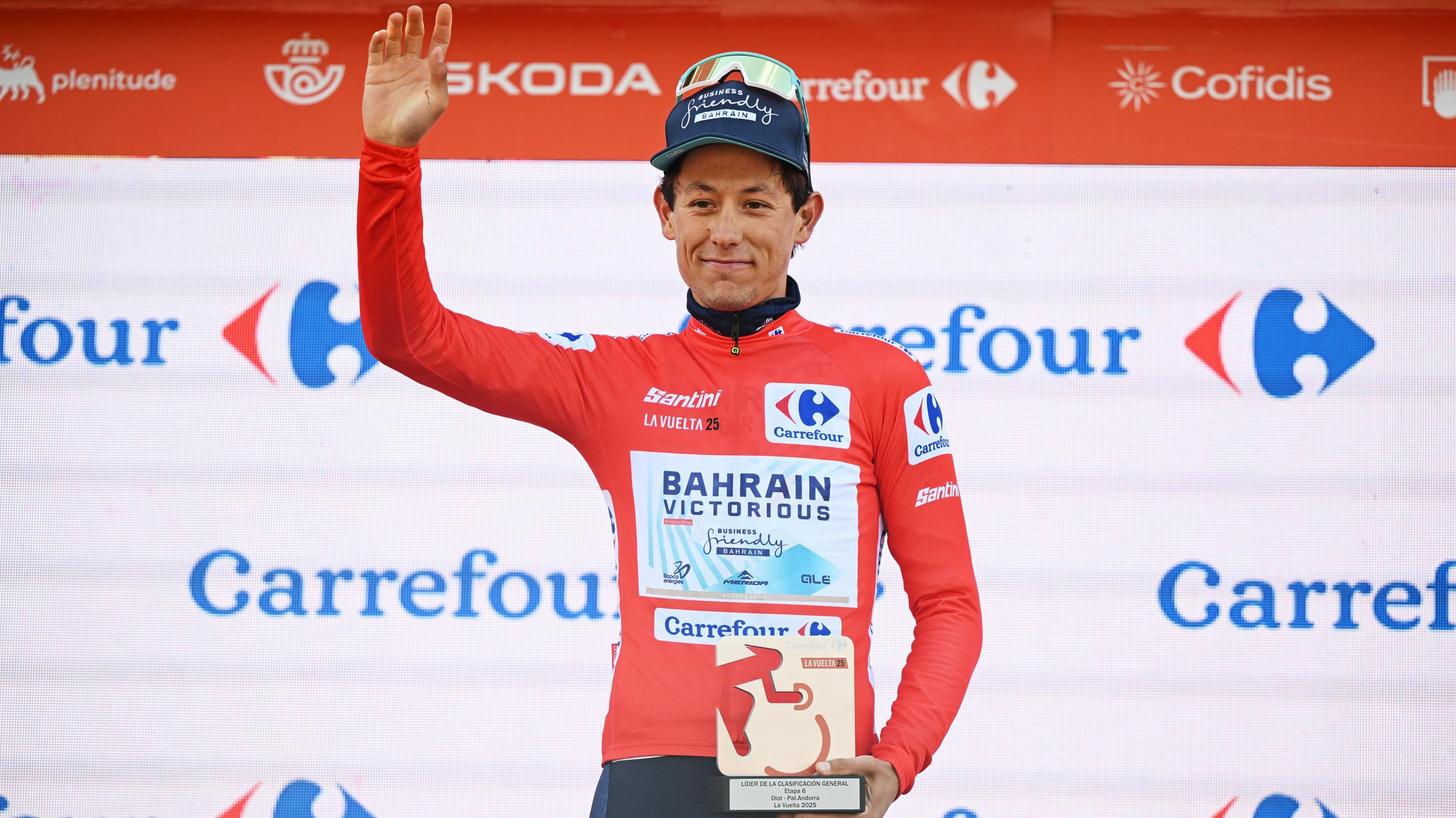 Torstein Traeen of Norway and Team Bahrain - Victorious celebrates at podium as Red Leader Jersey winner