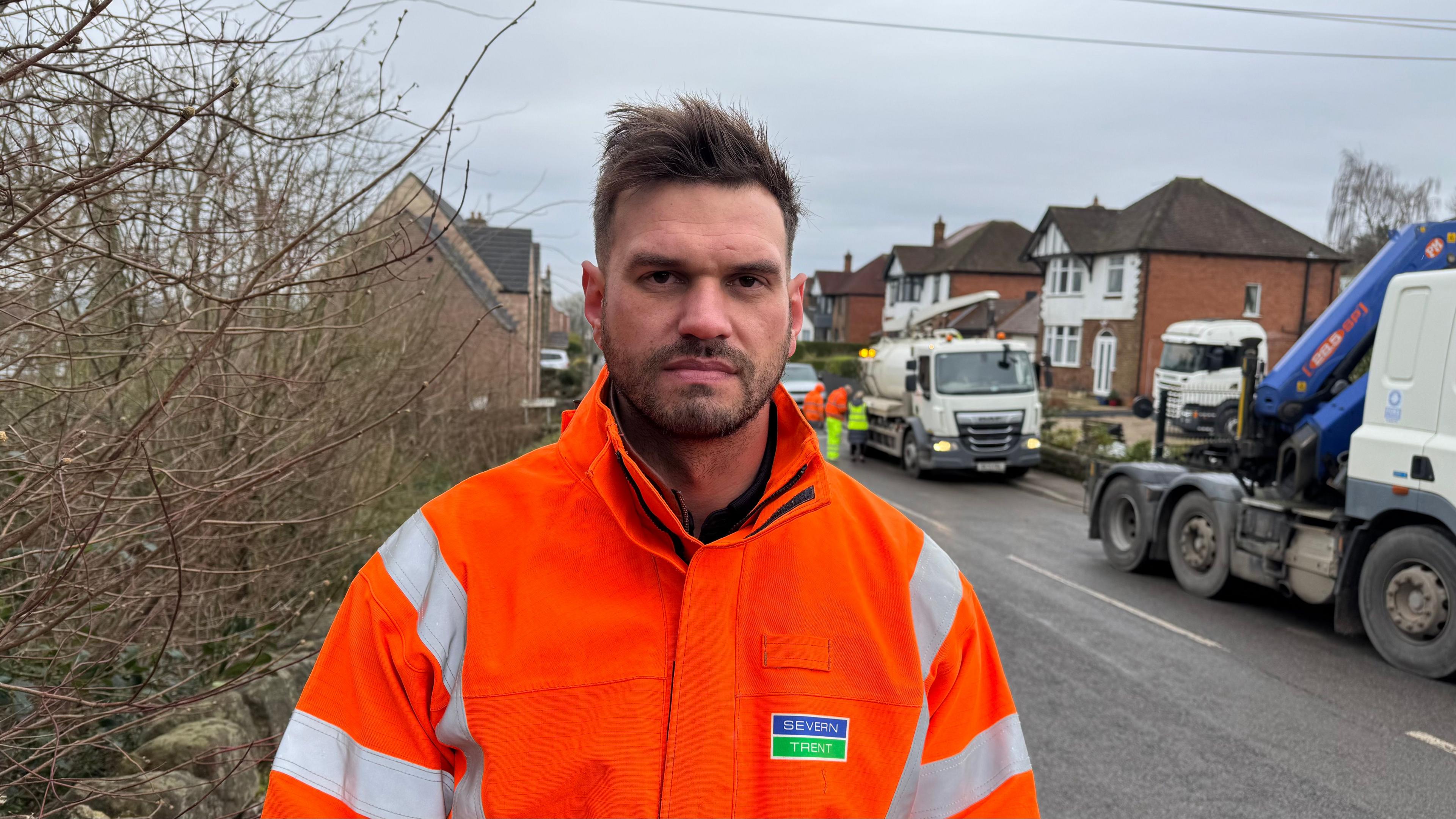 Ashley Holland from Severn Trent wearing an orange hi-vis jacket 