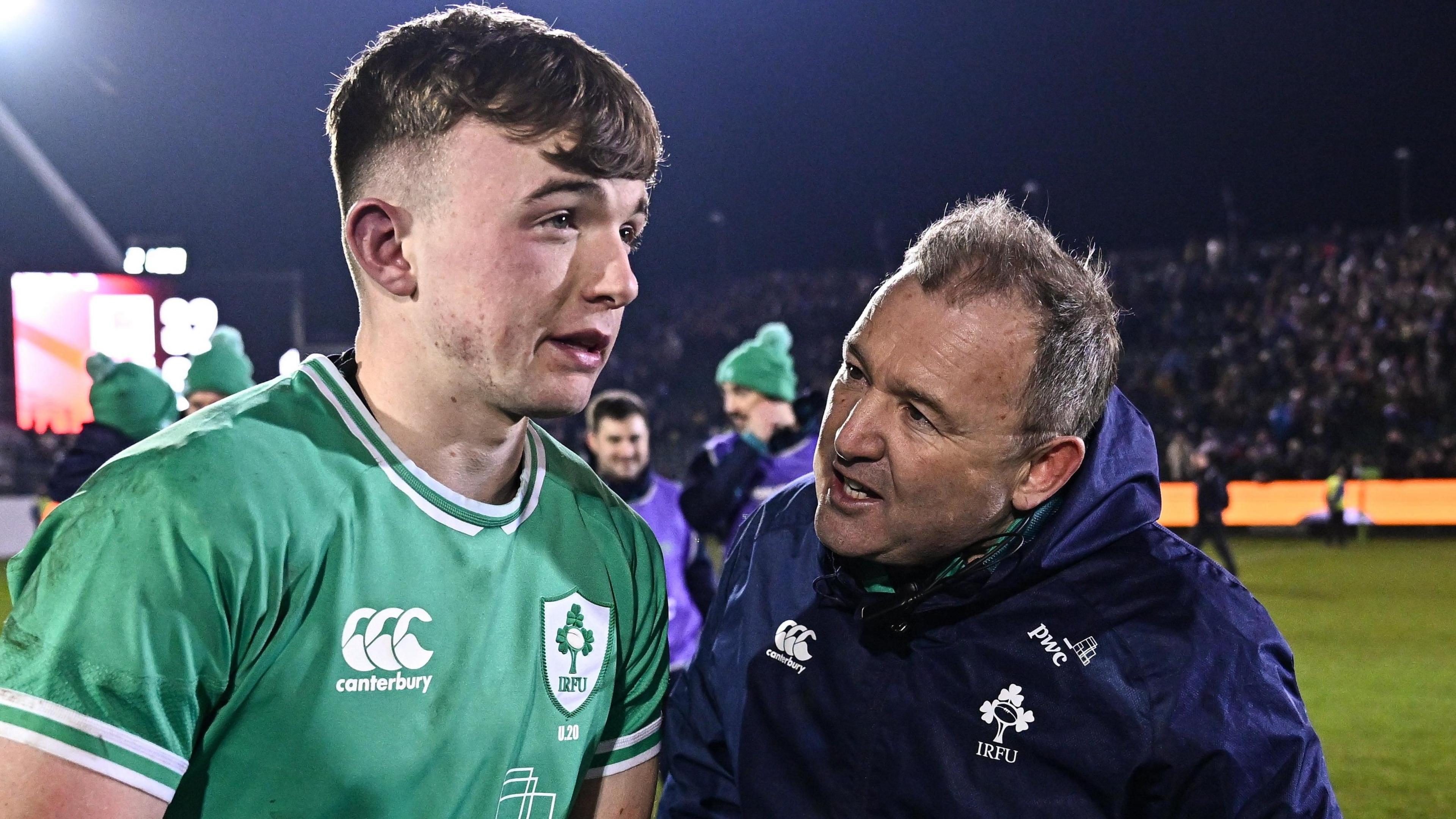 Richie and Jack Murphy speak to each other after a game