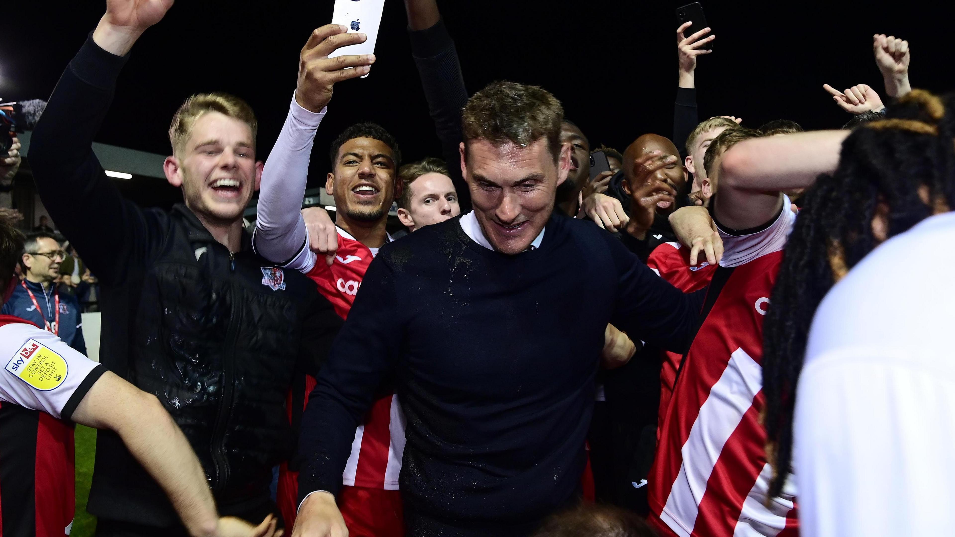 Matt Taylor celebrates promotion in 2022