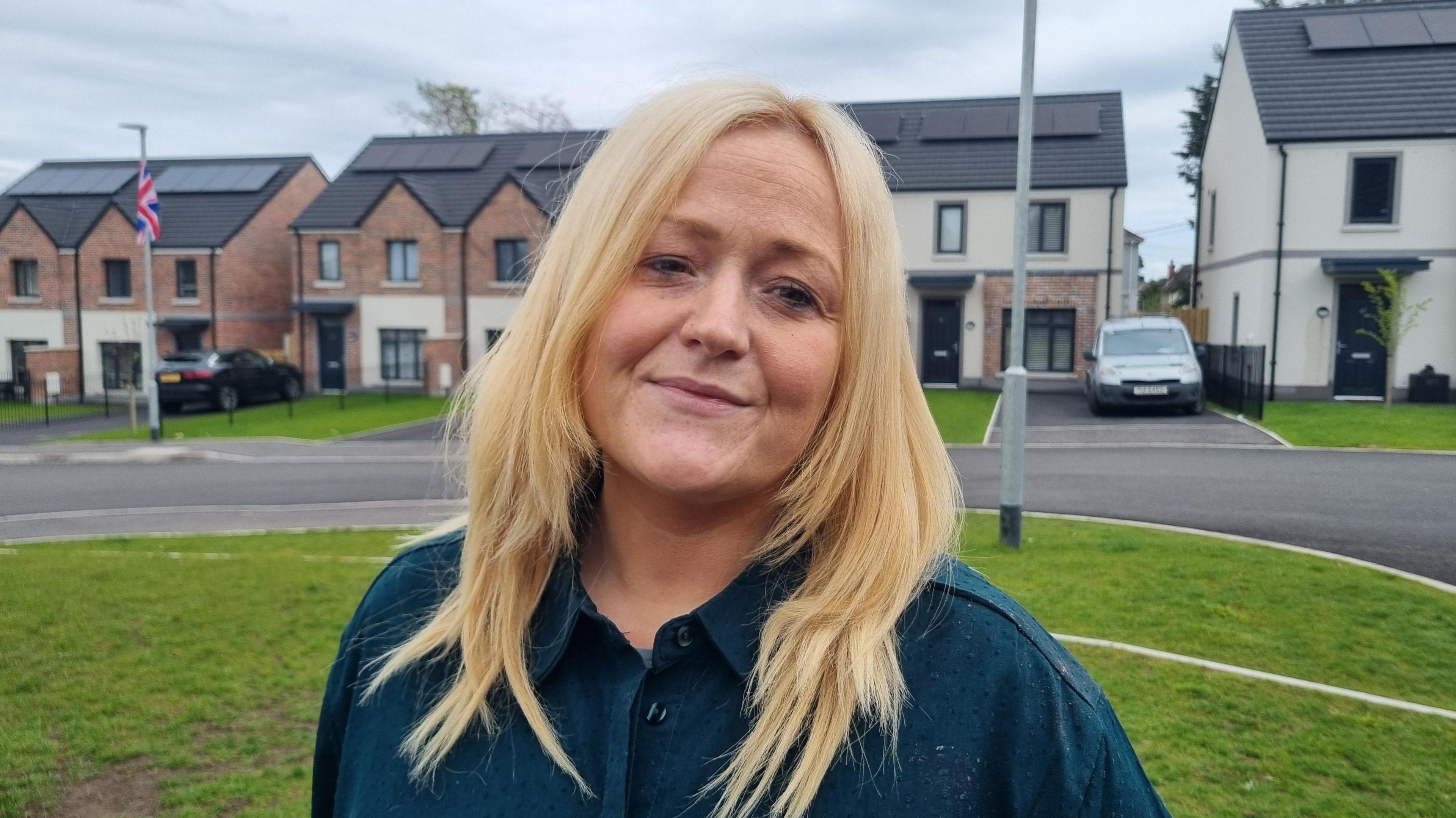 Carol Carey in the new housing development at Altona Drive in Lisburn