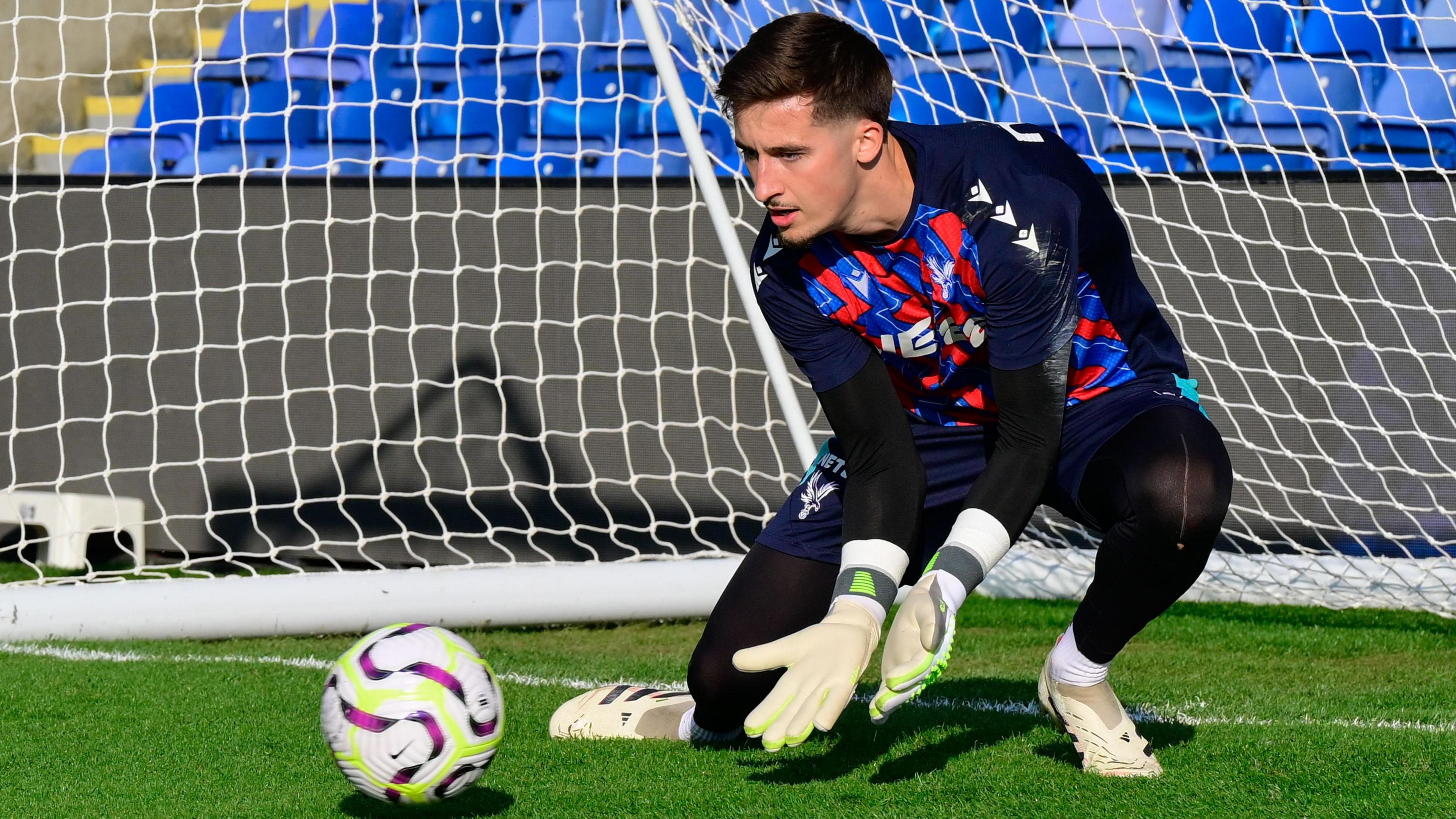 Louie Moulden pictured while warming up for a game for Crystal Palace U21s