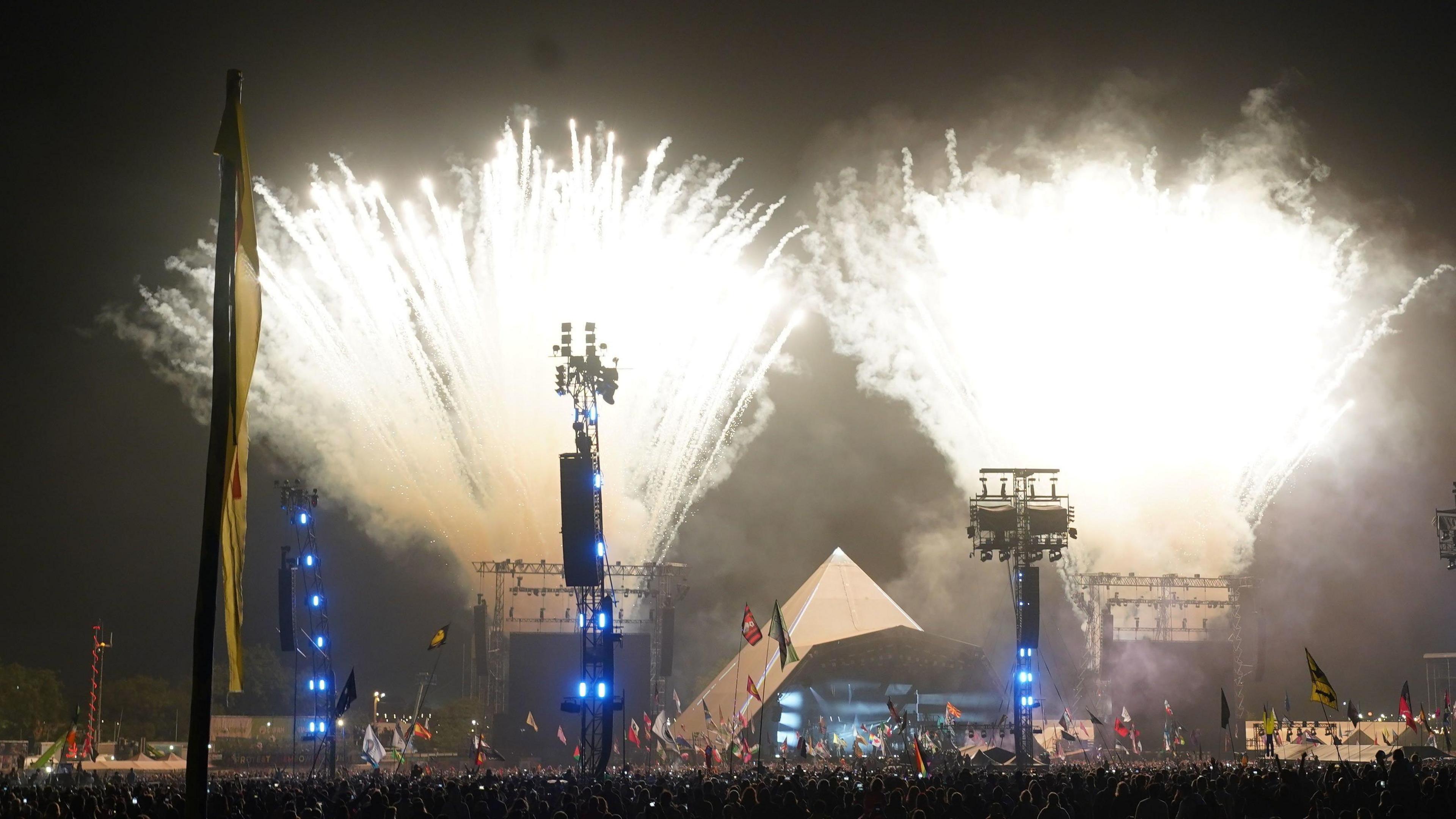 Fireworks coming from either side of the Pyramid Stage at night time after Dua Lipa performed during Glastonbury Festival at Worthy Farm in Somerset.