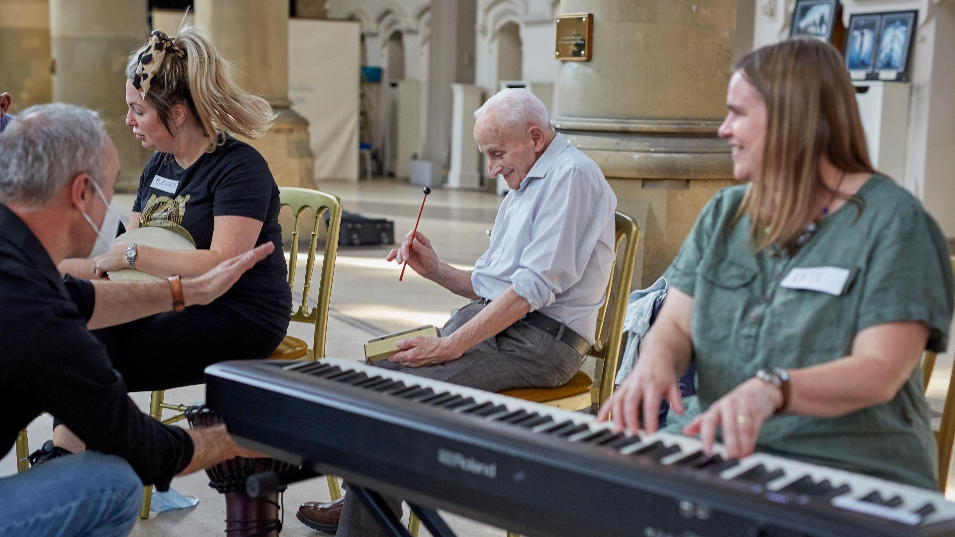 Undated handout photo issued by Manchester Camerata's Music in Mind music café in The Monastery, Gorton, of individuals in a music therapy session.