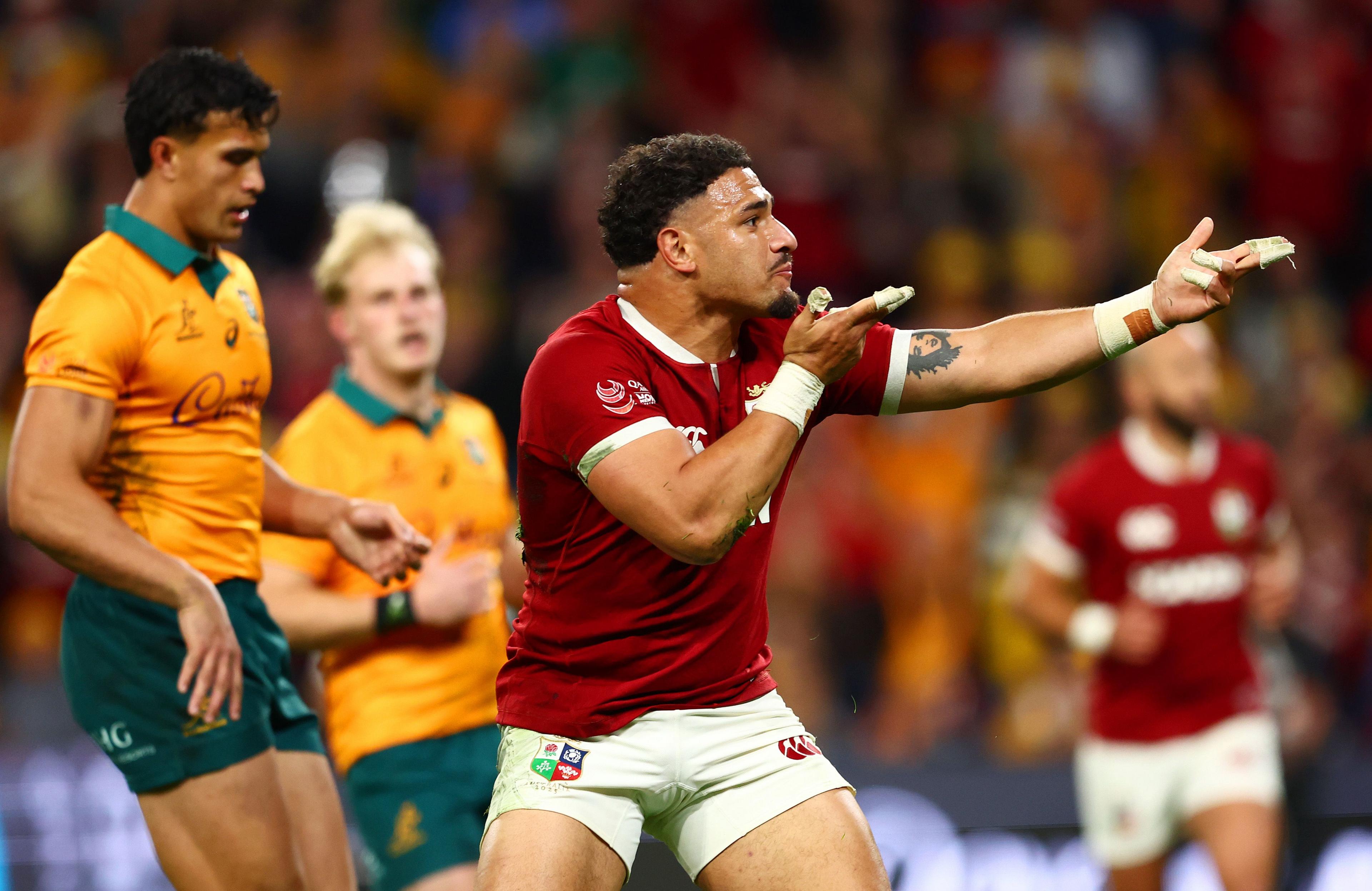 British and Irish Lions' Sione Tuipulotu celebrates after scoring a try during game one of the series between Australia Wallabies and British & Irish Lions at Suncorp Stadium in Brisbane, Australia. Photo by Chris Hyde