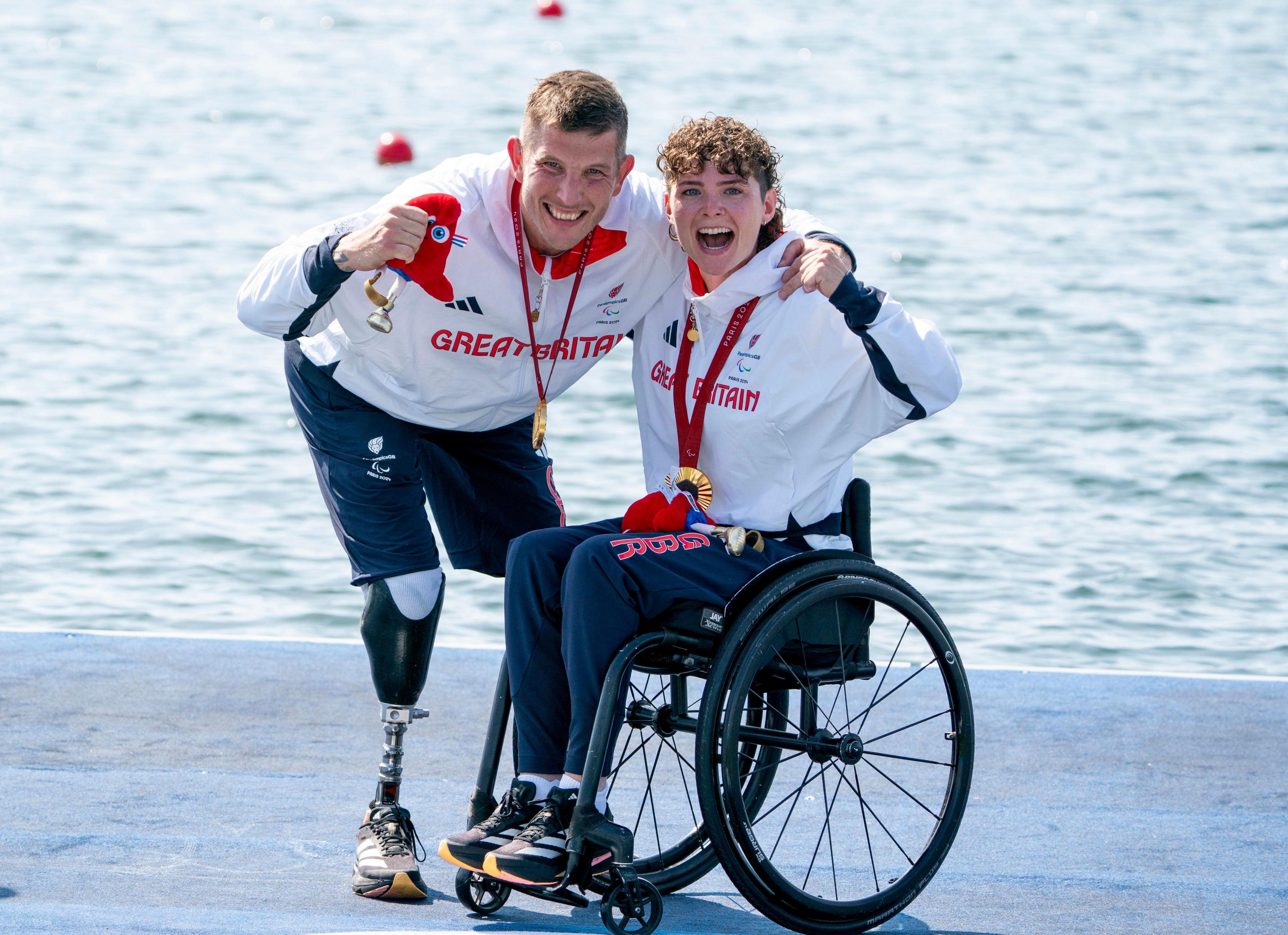 Great Britain's Lauren Rowles (left) and Gregg Stevenson celebrate with their gold medals