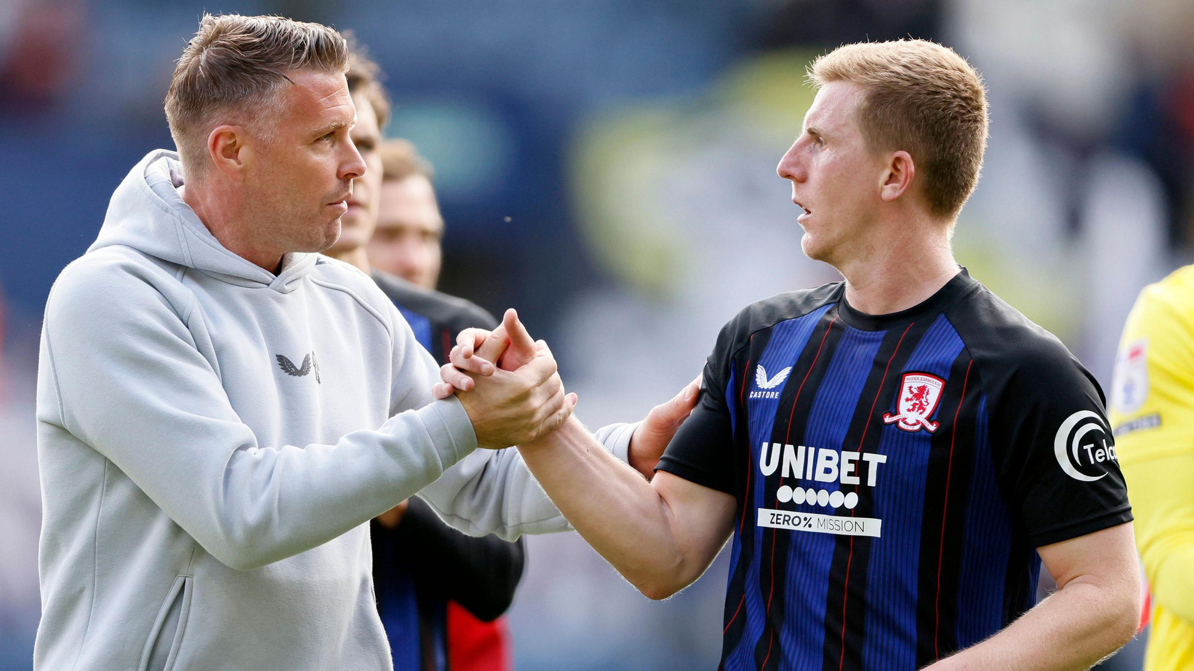 Middlesbrough head coach Rob Edwards with Middlesbrough's Matt Targett