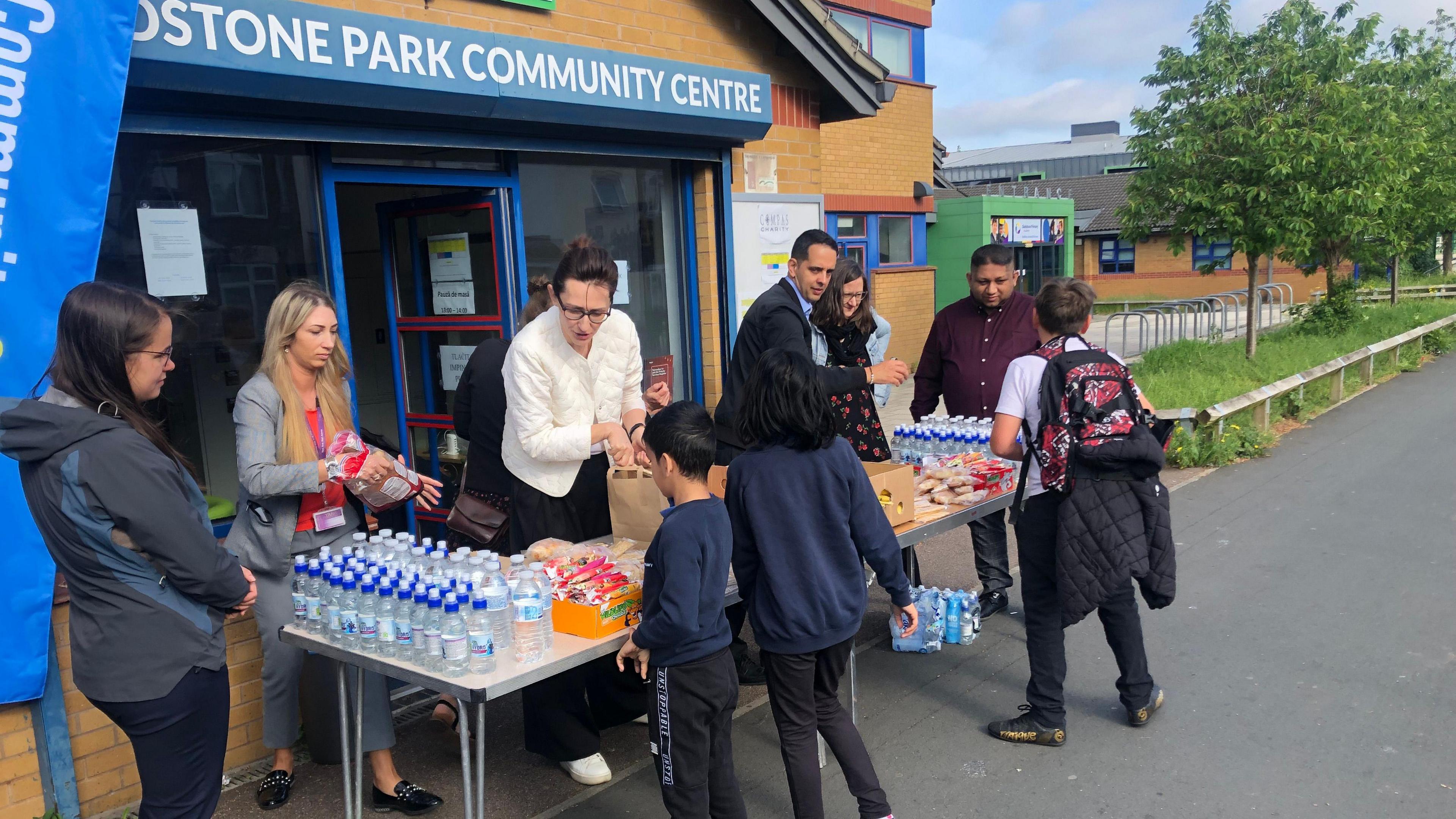 Children collecting breakfast 