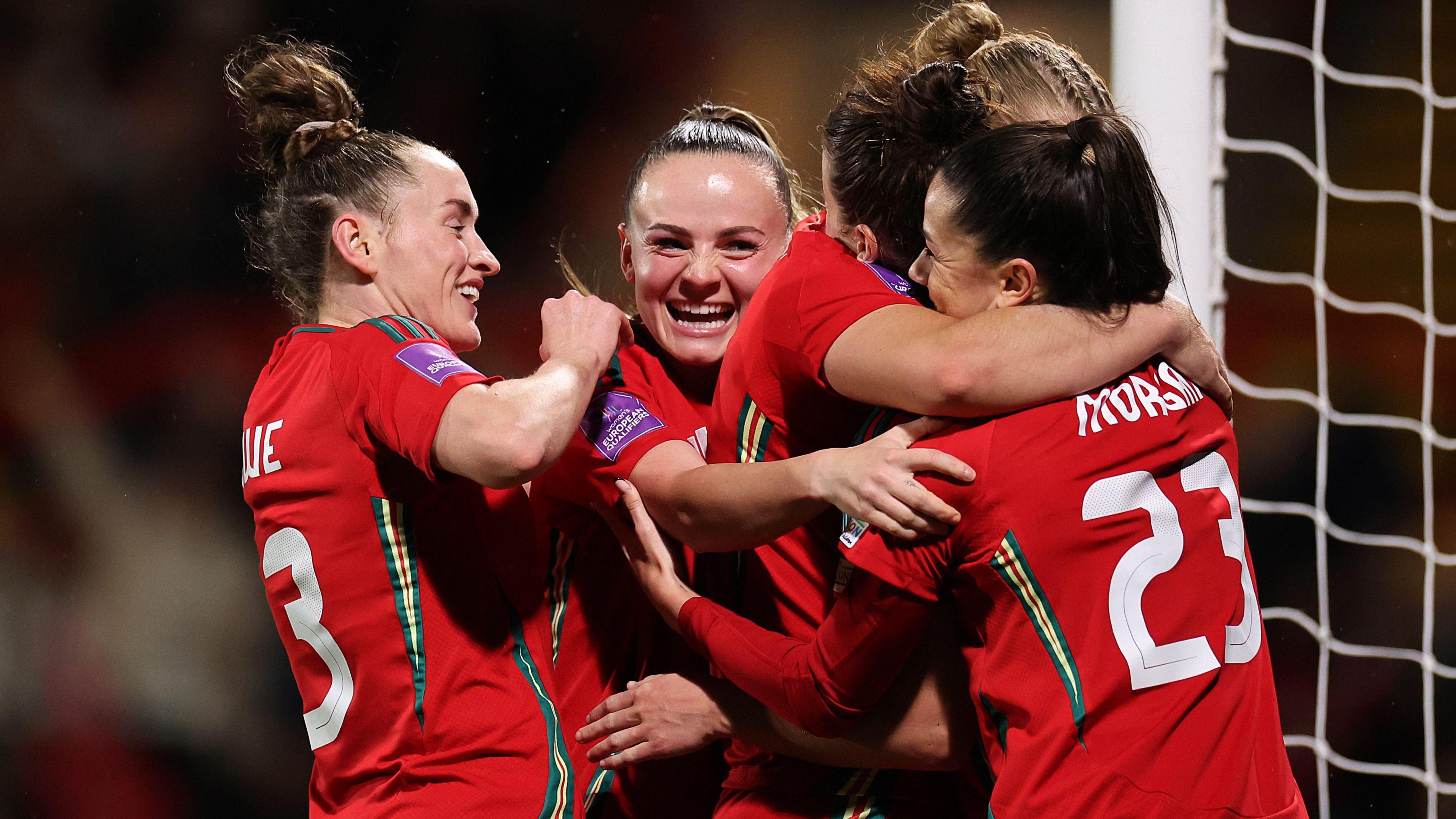 The Wales team celebrating a goal 