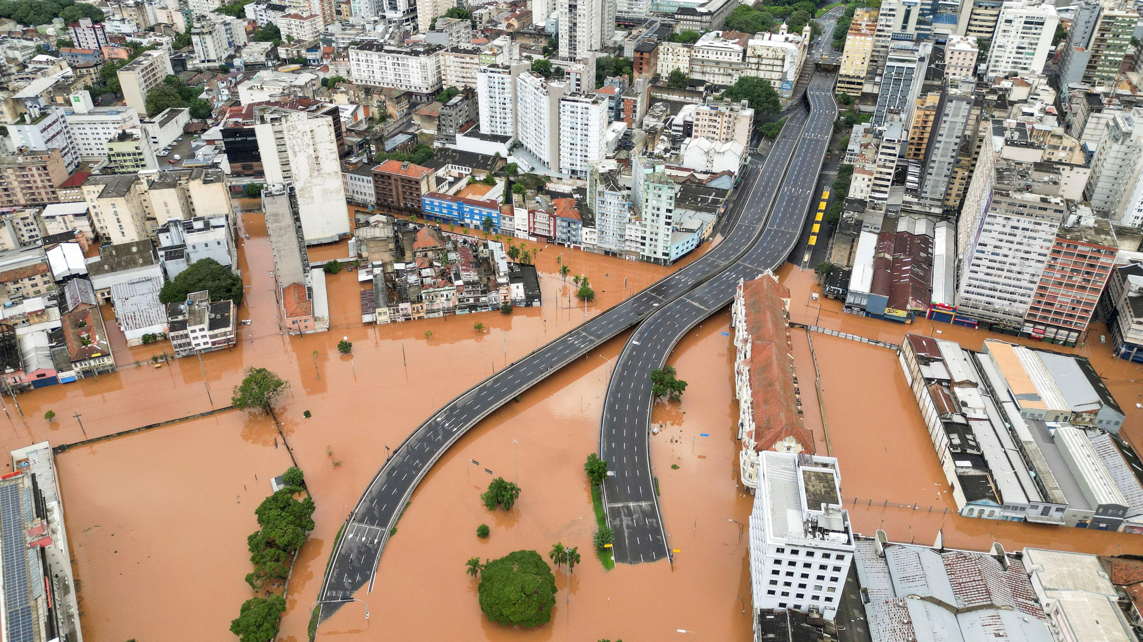  A drone view shows a flooded city center after people were evacuated in Porto Alegre, in Rio Grande do Sul state, Brazil, May 5, 2024. 