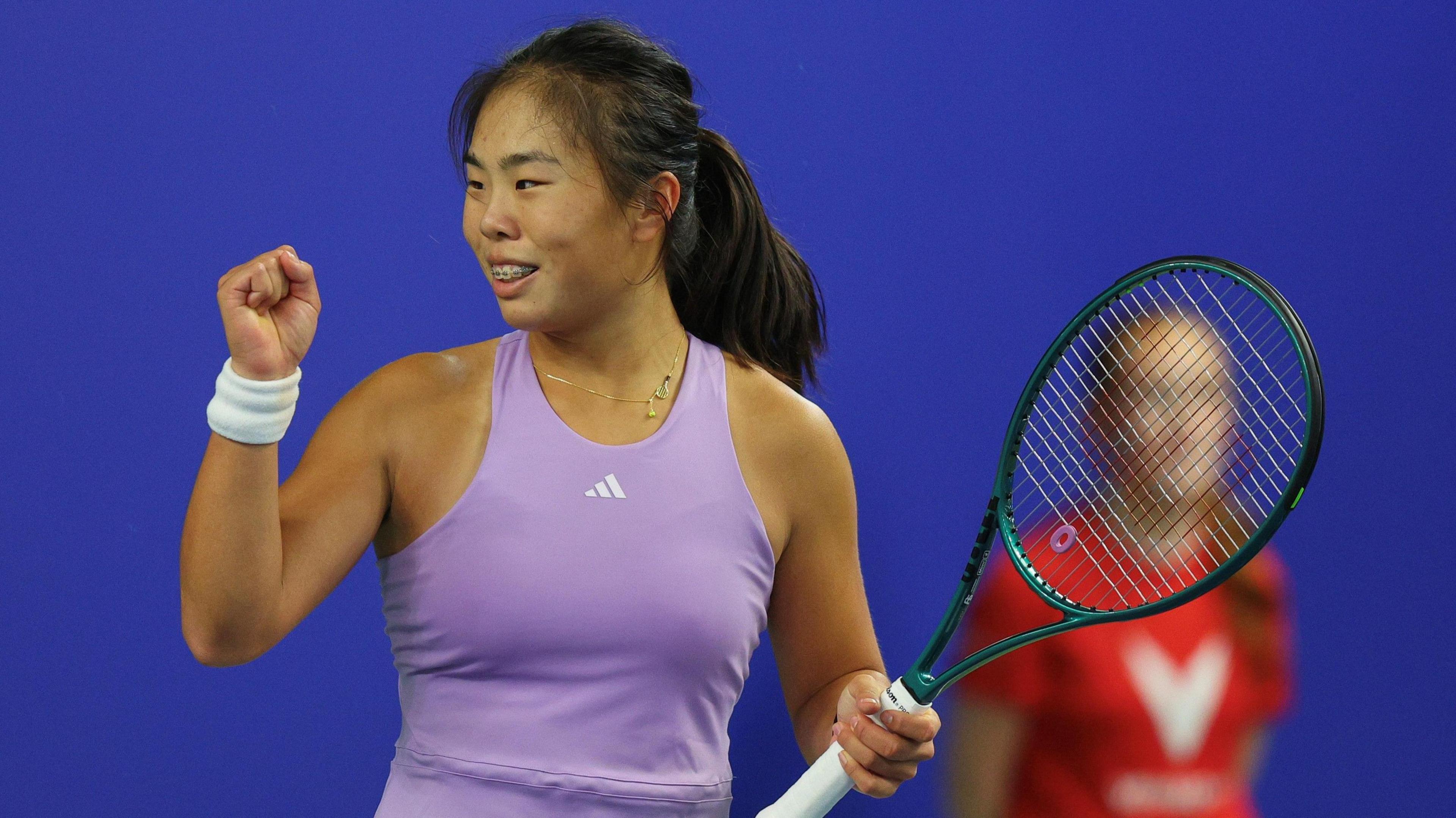 Mimi Xu celebrates a winner at the Wrexham Open