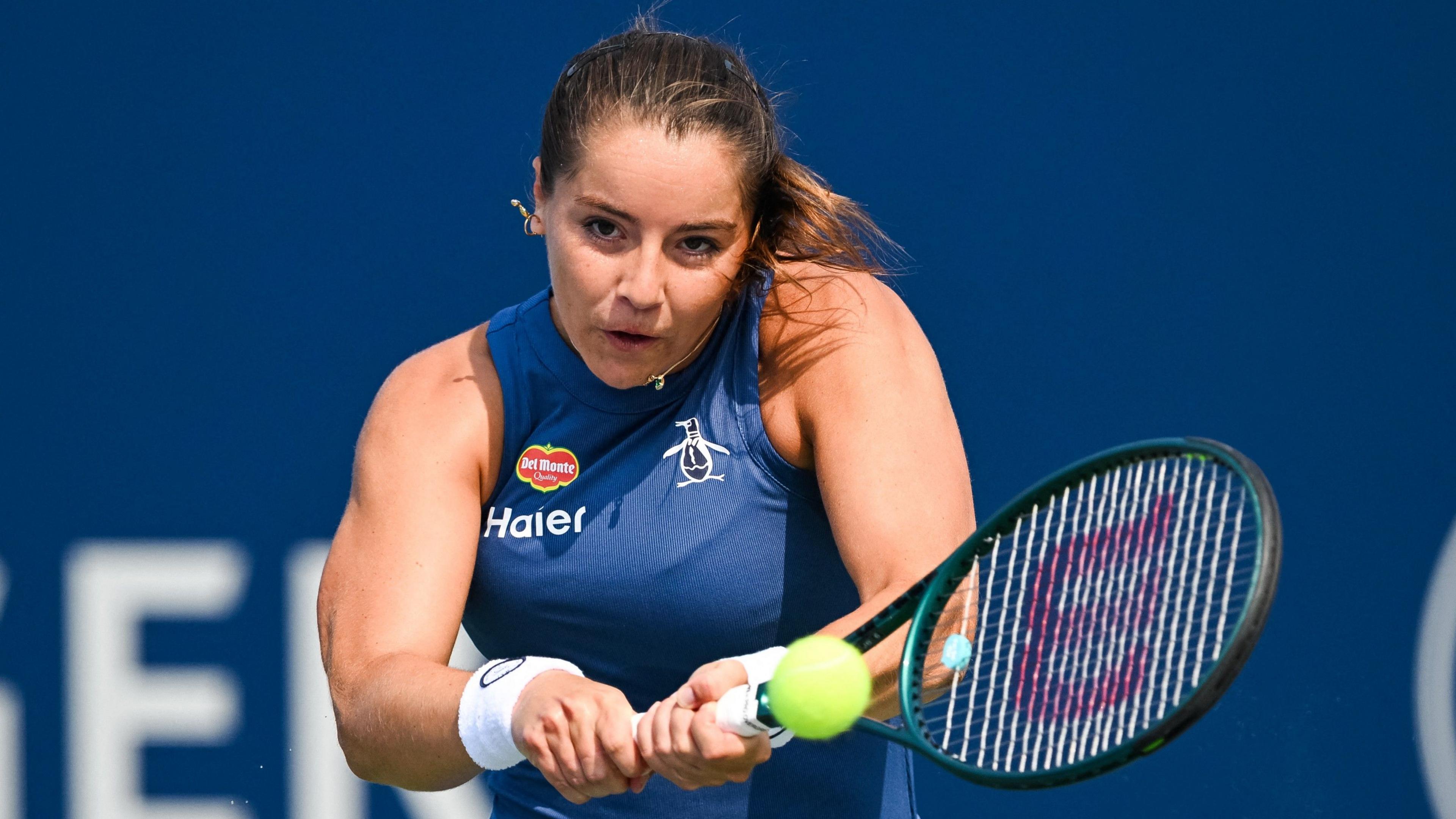 Jodie Burrage hits a backhand