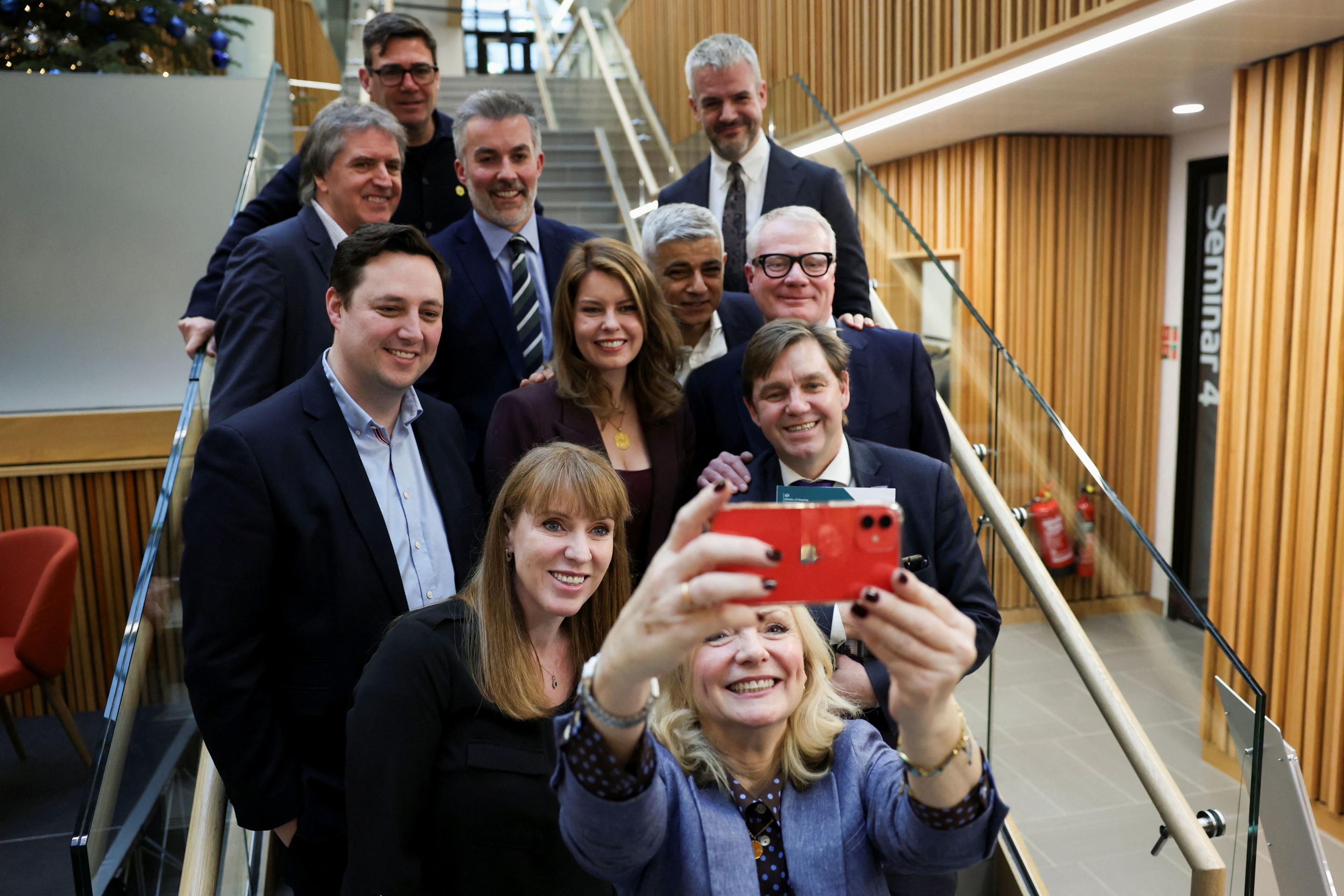 Deputy Prime Minister Angela Rayner, the Mayor of London Sadiq Khan and Mayor of West Yorkshire Tracy Brabin pose for a selfie with regional mayors in Leeds