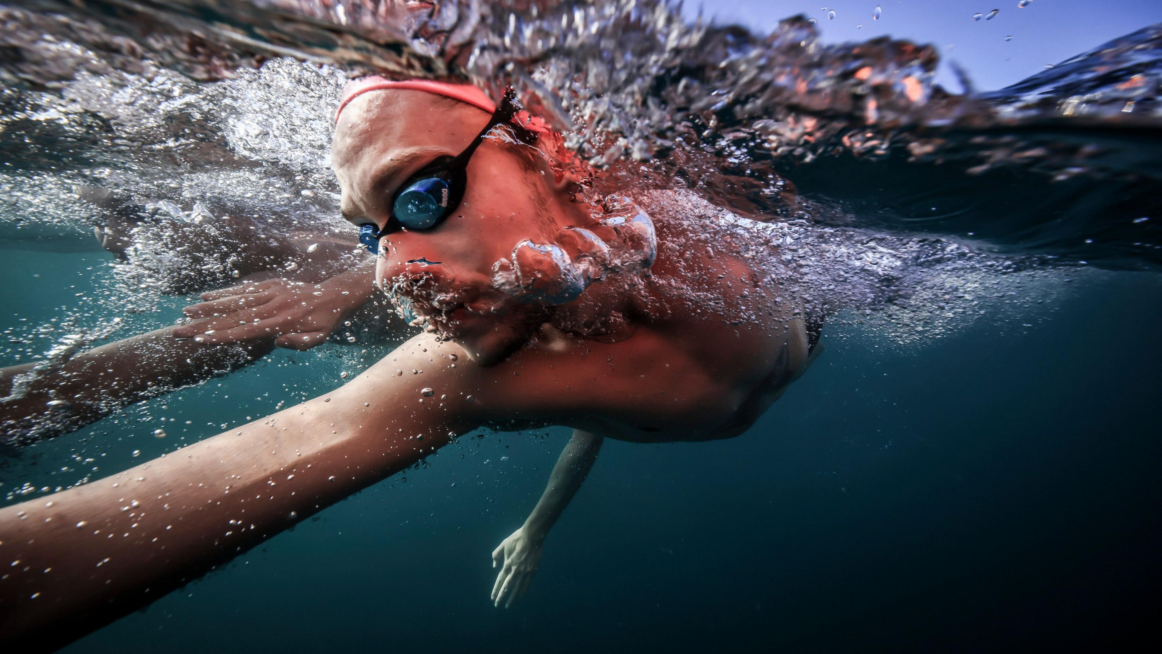 An athlete trains before the World Aquatics Open Water Swimming World Cup on day 18 of the Neom Beach Games in Saudi Arabia, 19 November 