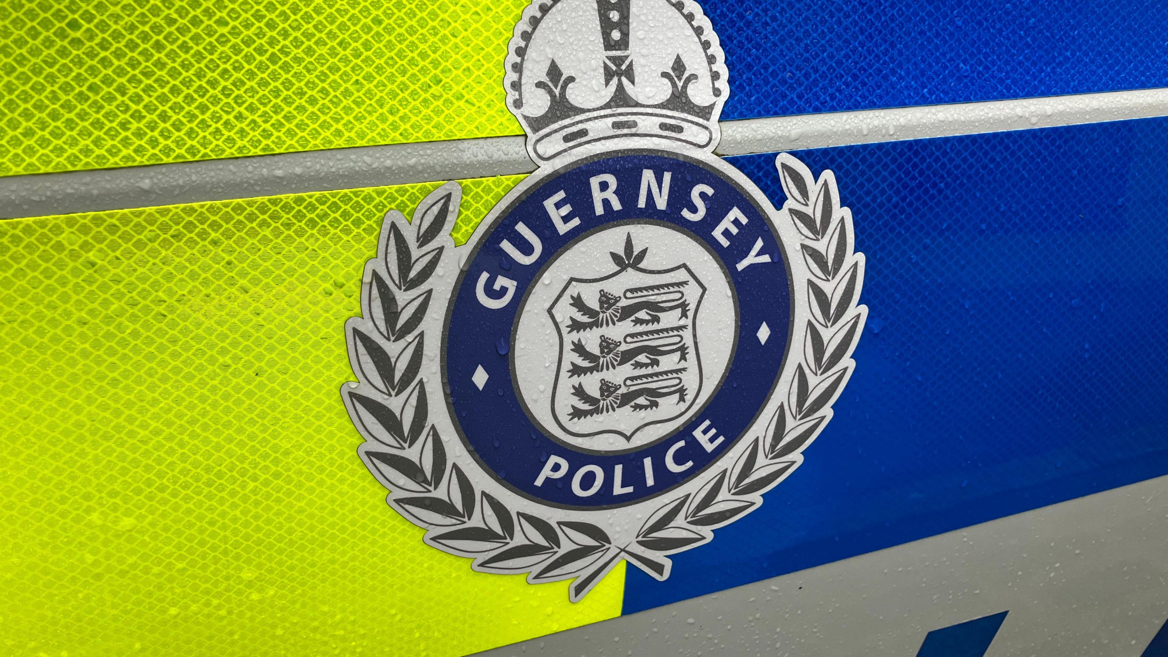 A Guernsey Police car up close, featuring the logo of Guernsey Police.