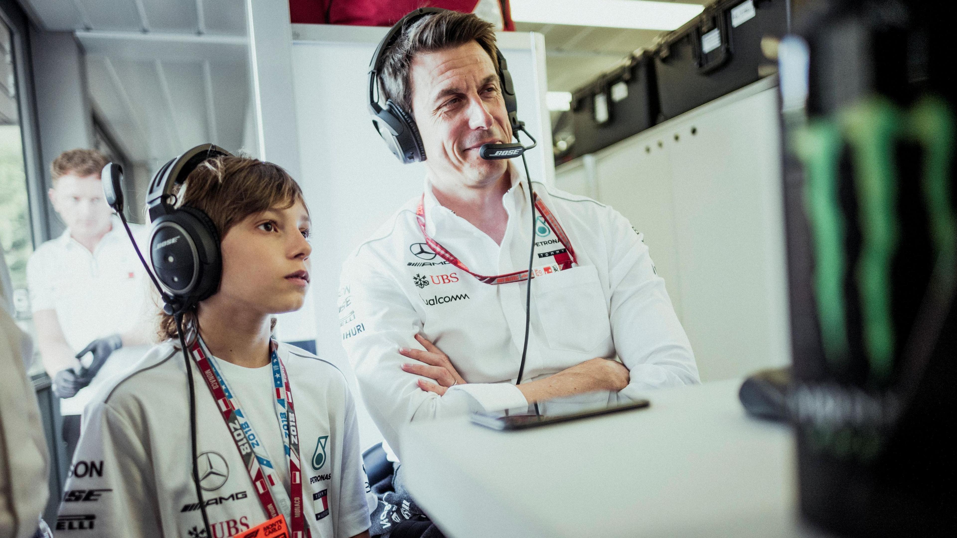 Kimi Antonelli, then aged 11, standing alongside Mercedes F1 team boss Toto Wolff at the 2018 Monaco Grand Prix