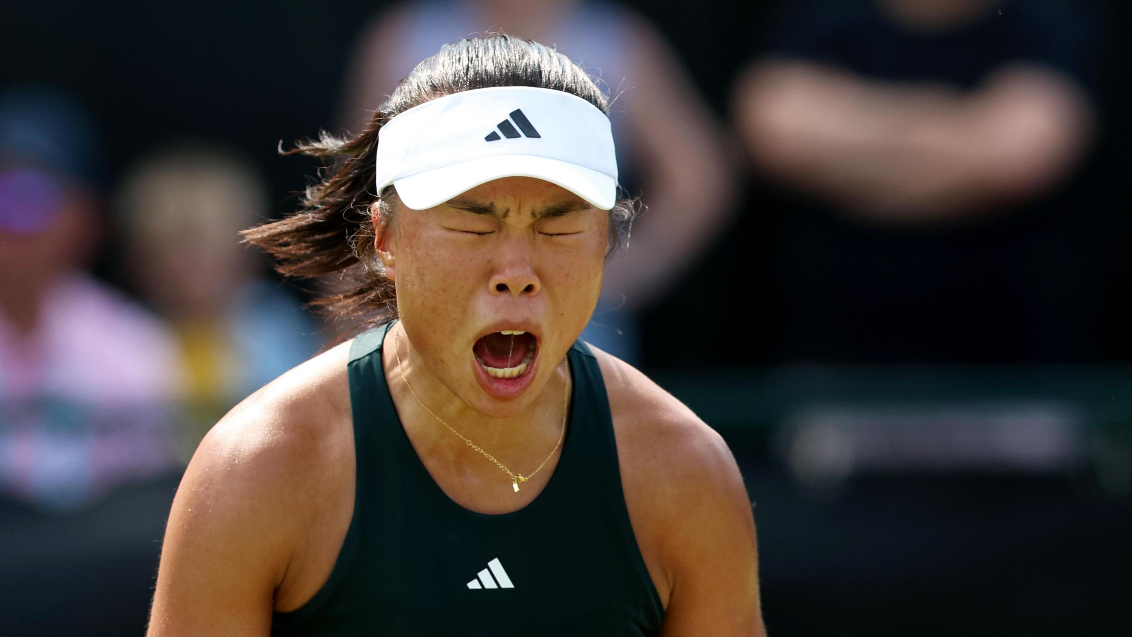 Mimi Xu celebrates winning a point at the Nottingham Open