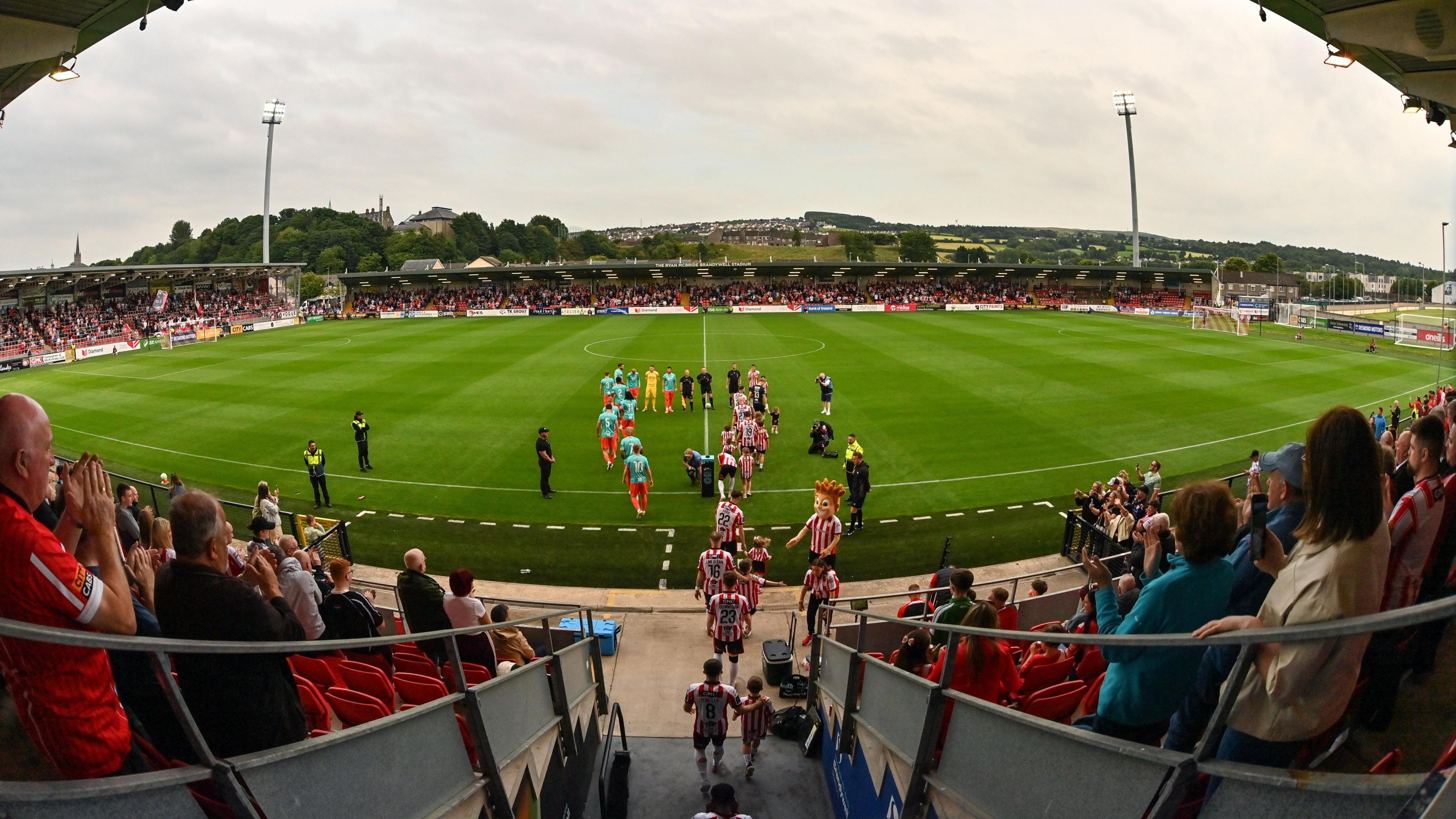 A view of teams walking out at the Brandywell