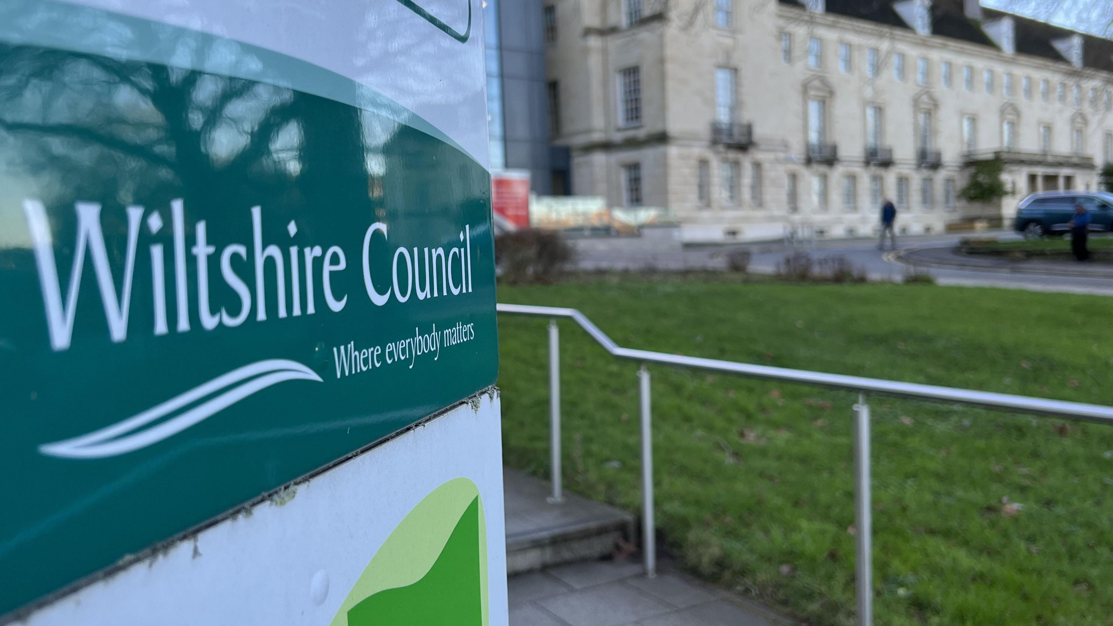 Wiltshire Council sign outside County Hall in Trowbridge