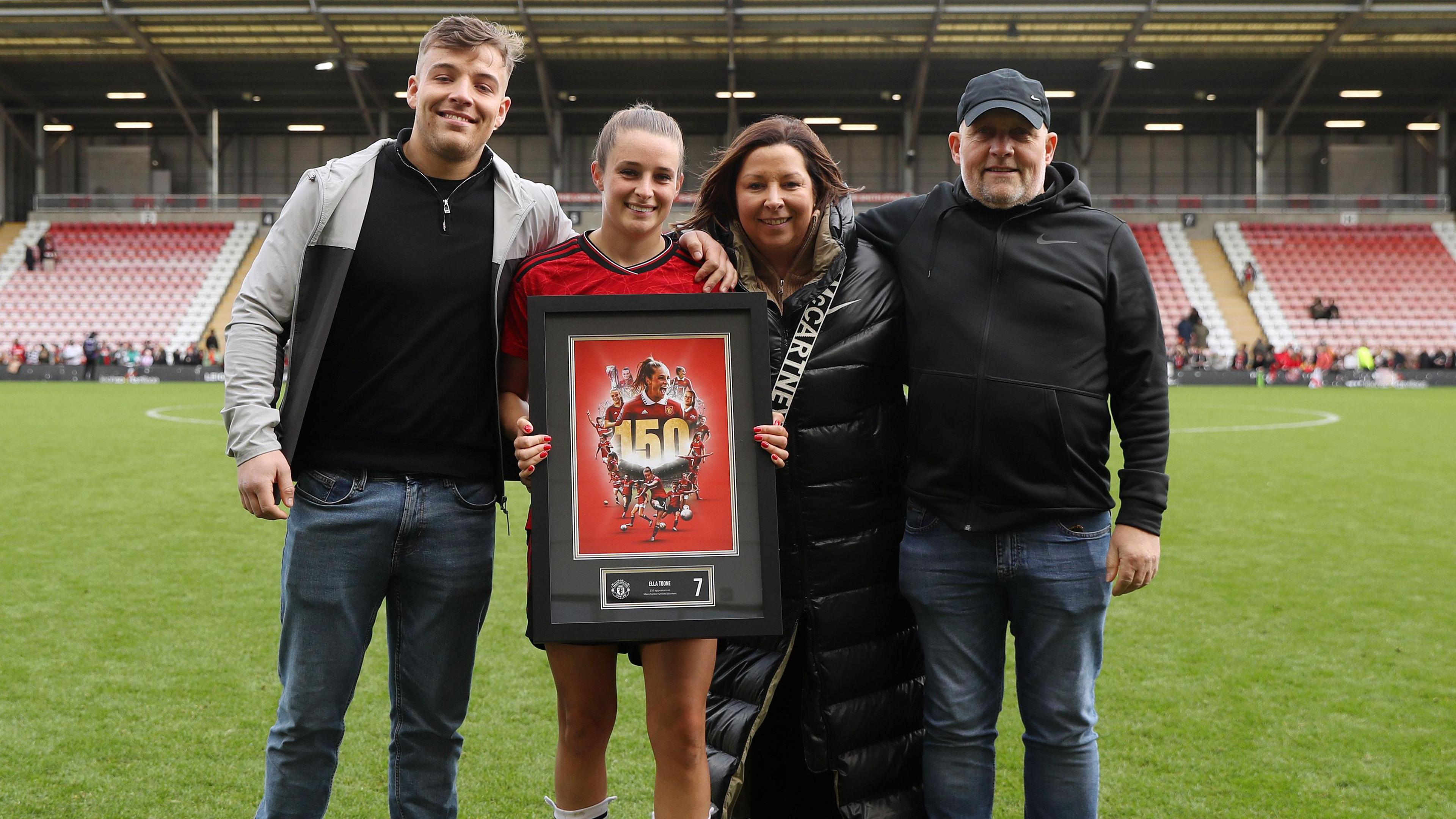Ella Toone alongside her brother, mum and dad