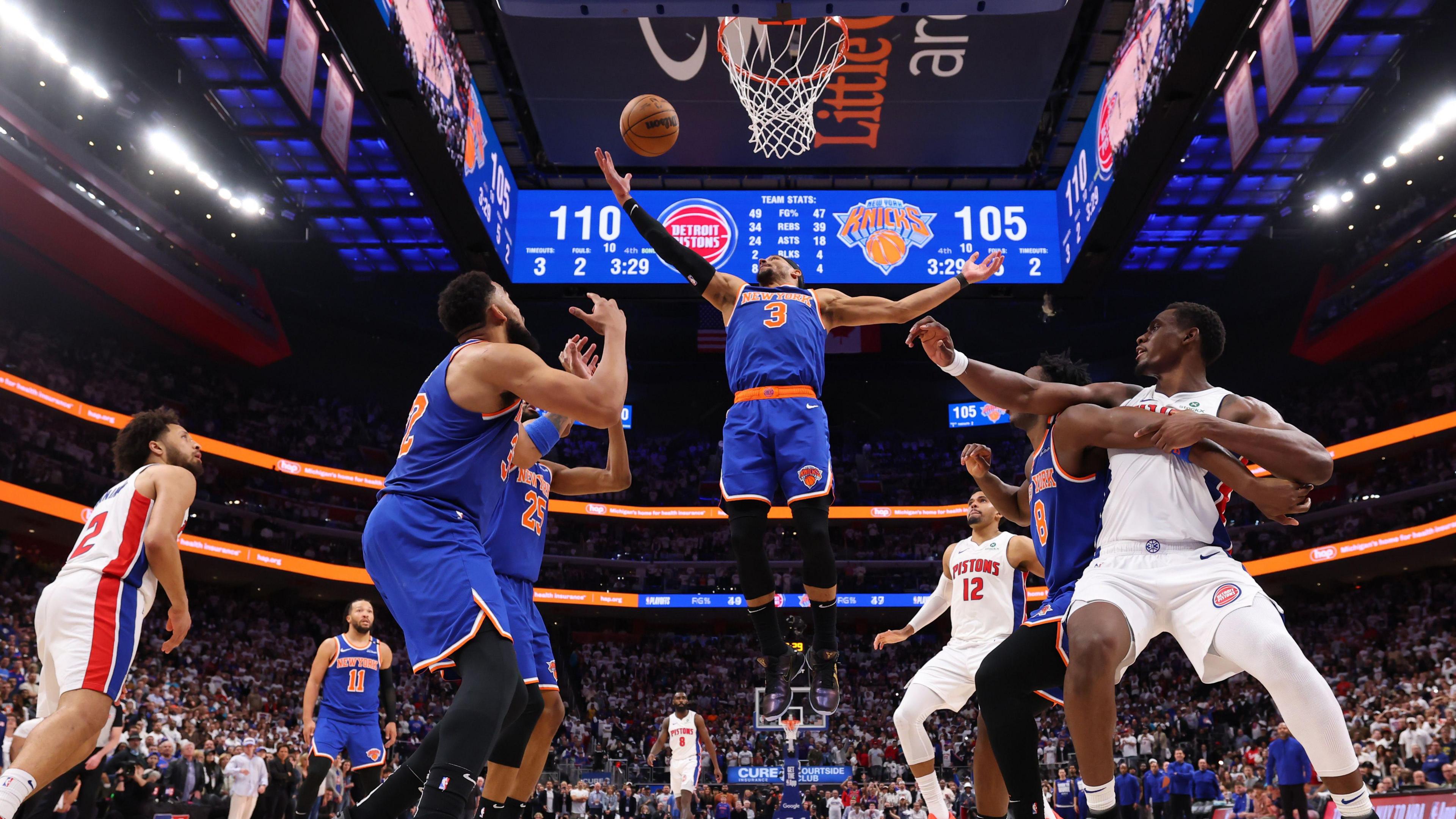 New York Knicks' Josh Hart rebounds the ball during the fourth quarter against the Detroit Pistons in Game Six of the Eastern Conference First Round NBA Playoffs at Little Caesars Arena in Detroit, Michigan