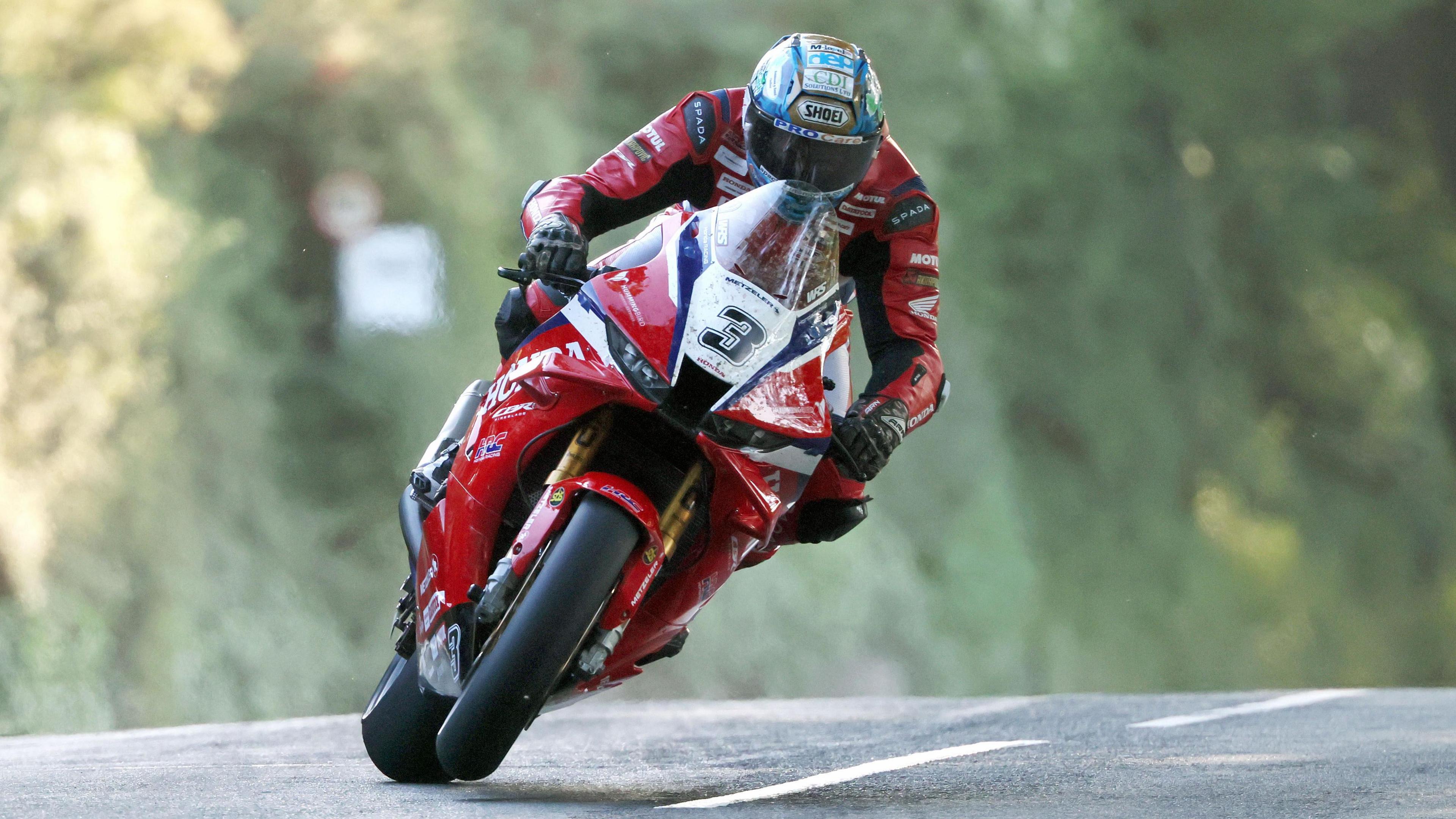 Dean Harrison riding his red Honda
