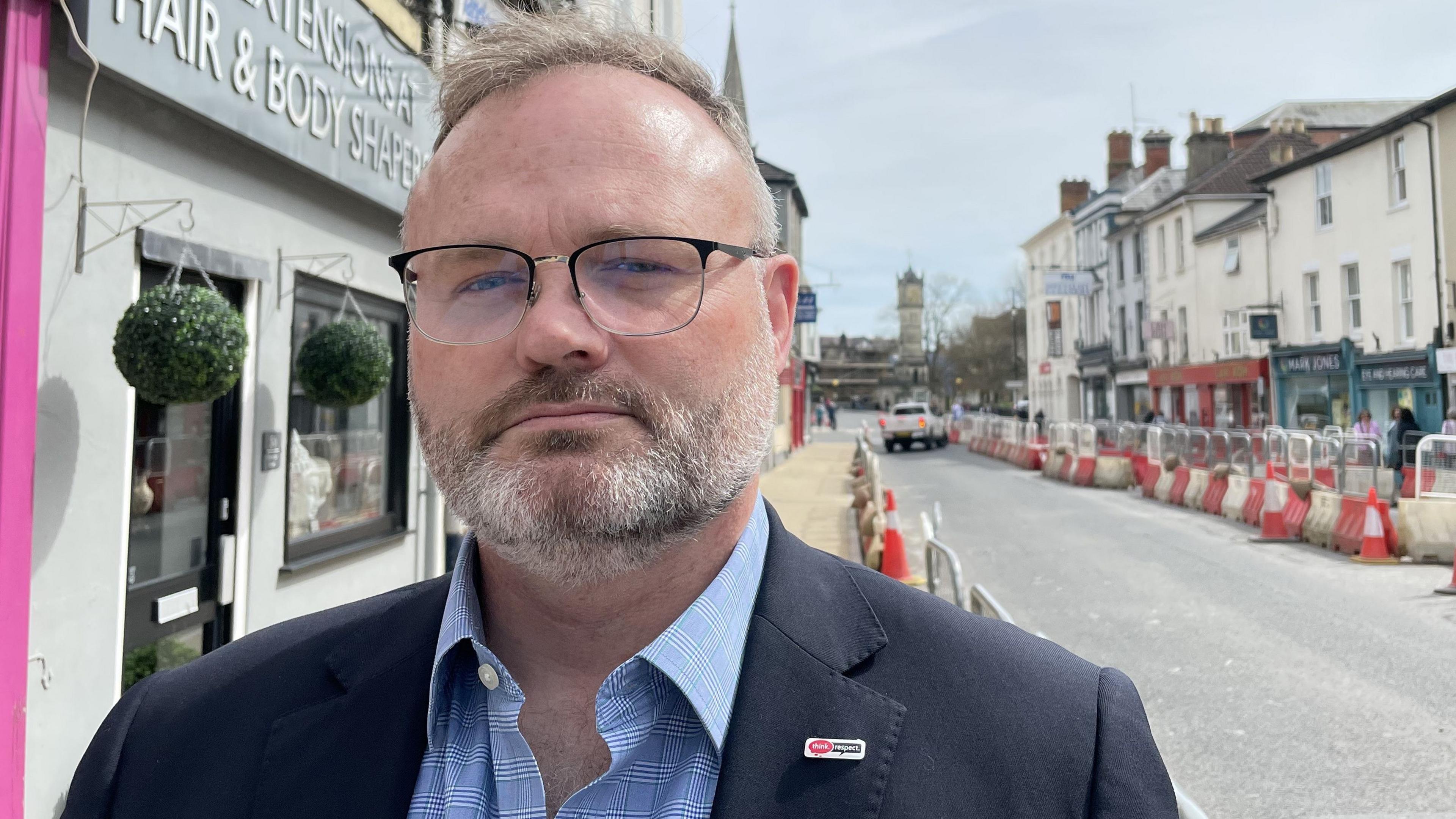 Richard Hemingway - health, safety and well-being director for Milestone standing on Fisherton Street with roadworks behind him