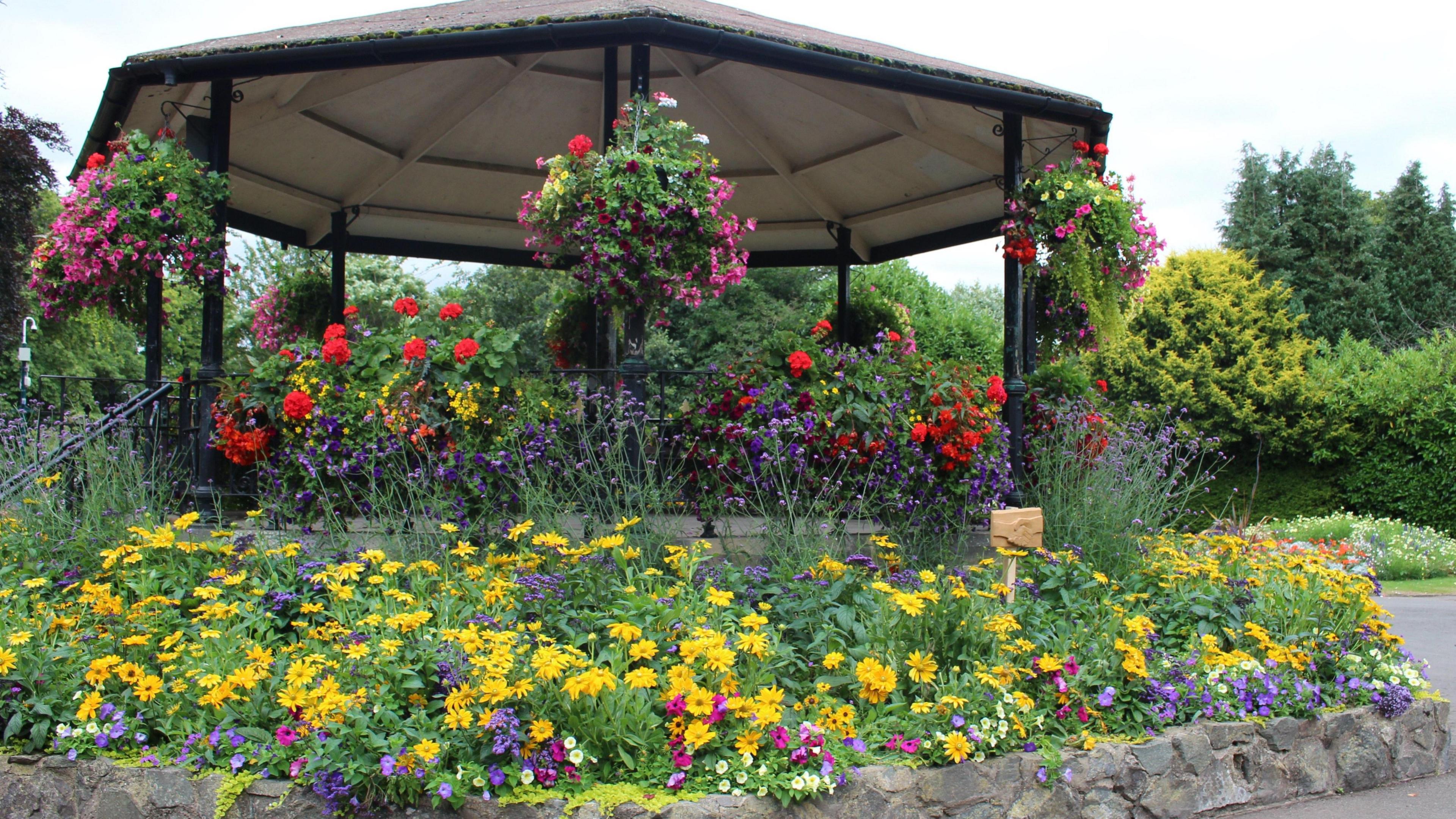 Flowers next to the bandstand in the park