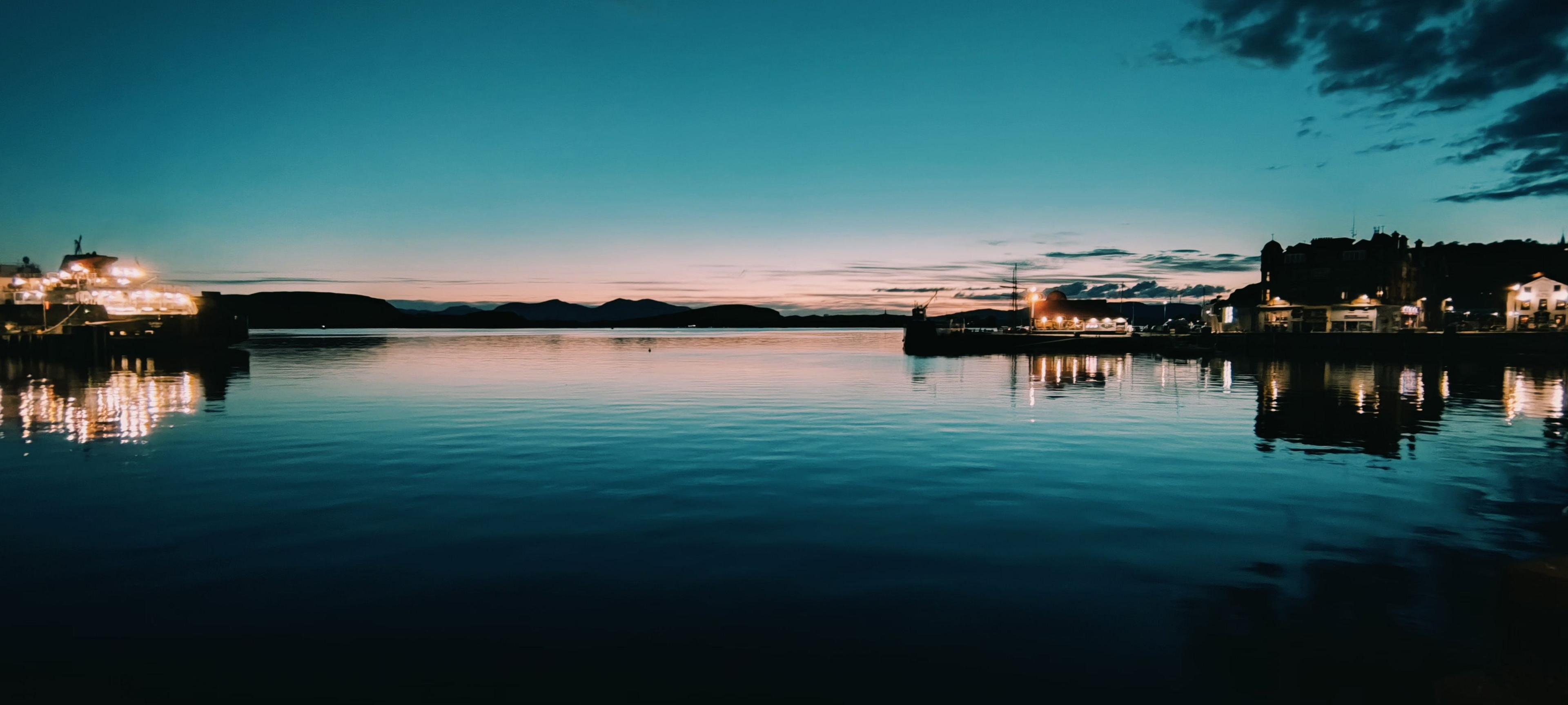 Landscape image of a harbour at sunset