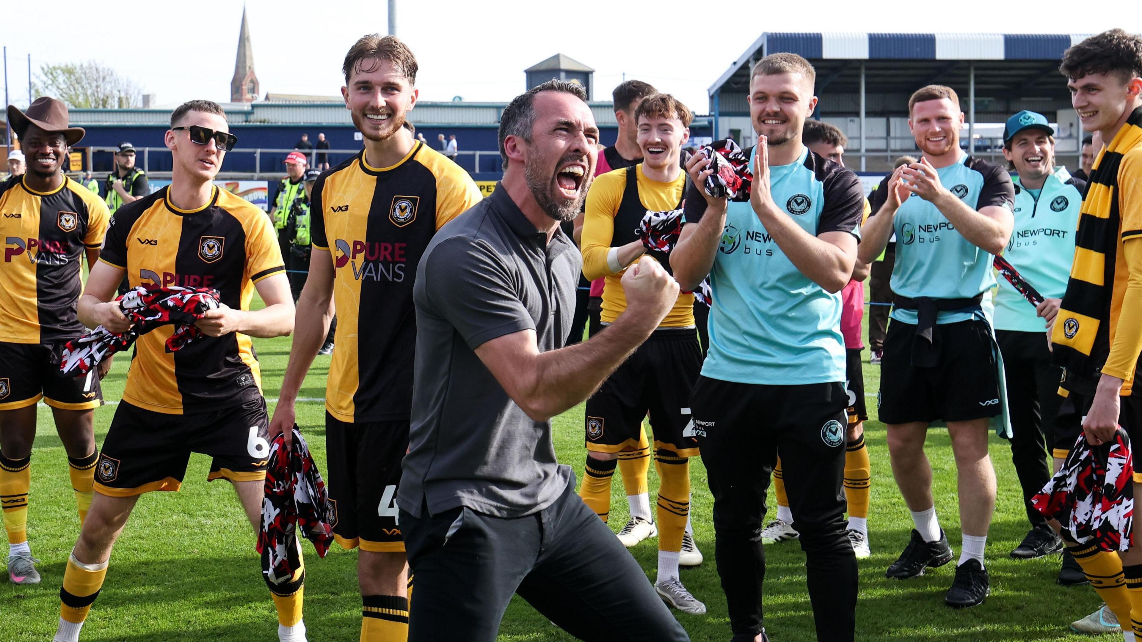 Christian Fuchs celebrates Newport's League Two survival at Barrow