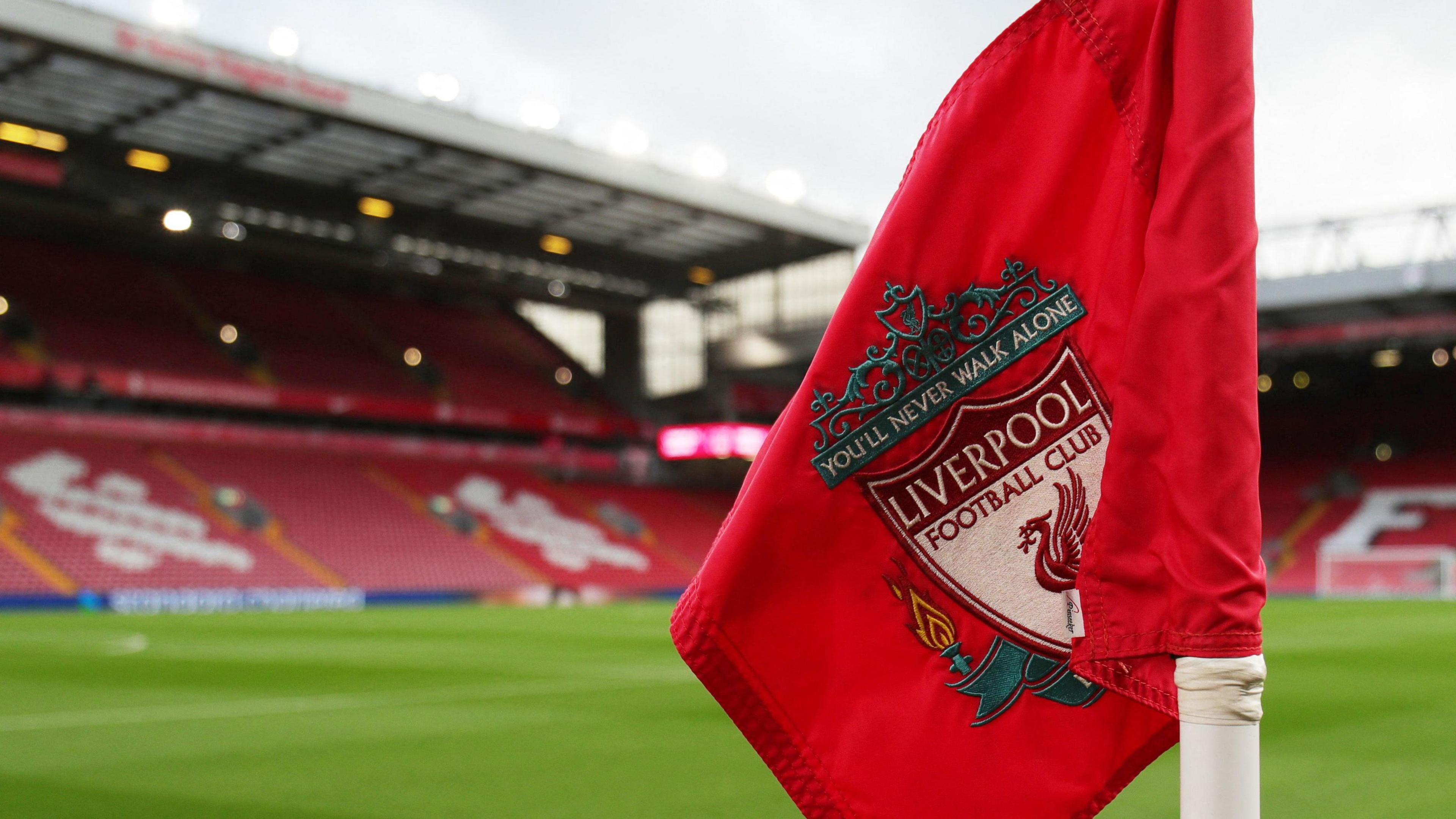 General view of the field at Anfield, with a corner flag in the foreground