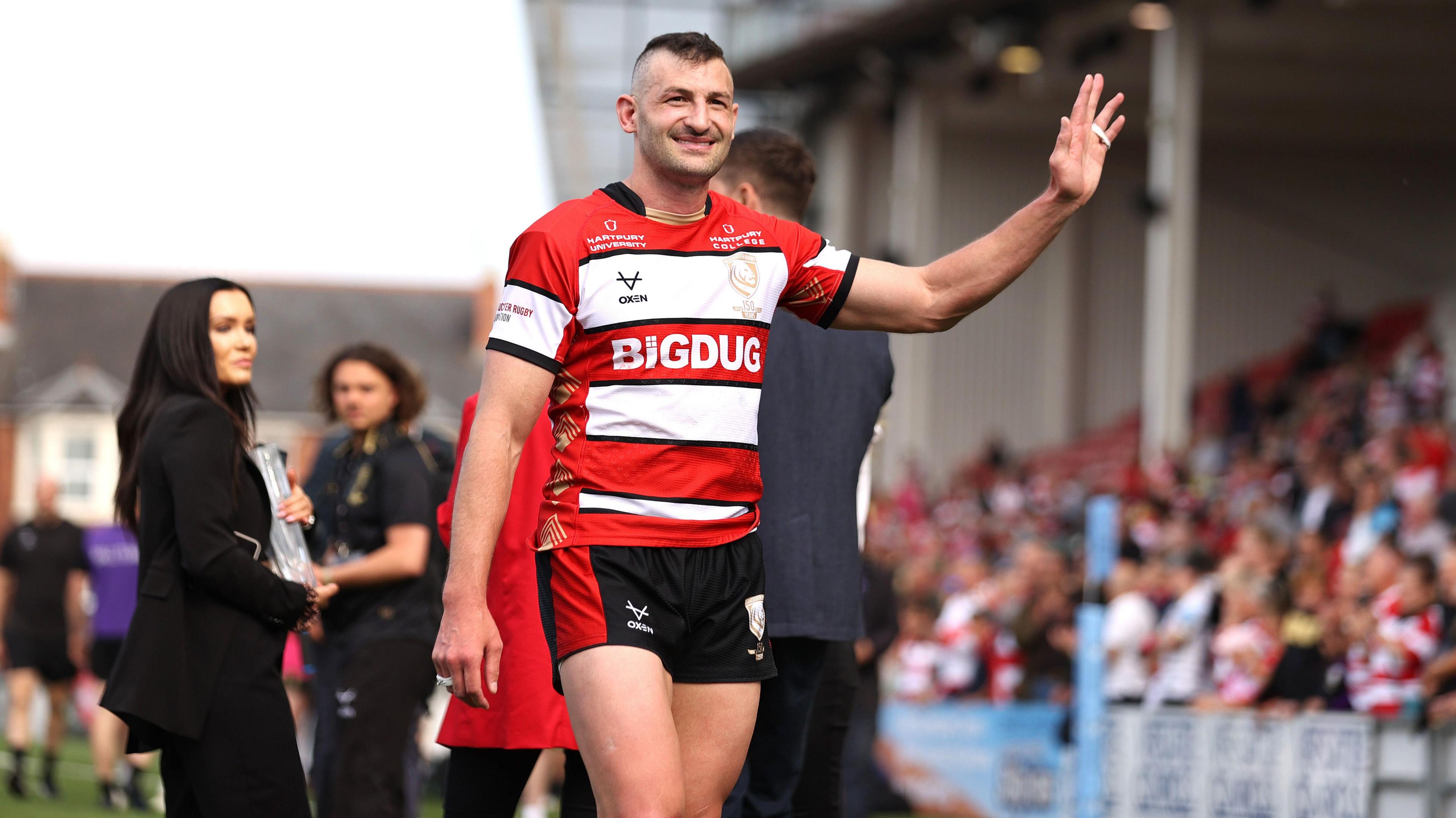 Jonny May waving on the field at Kingsholm