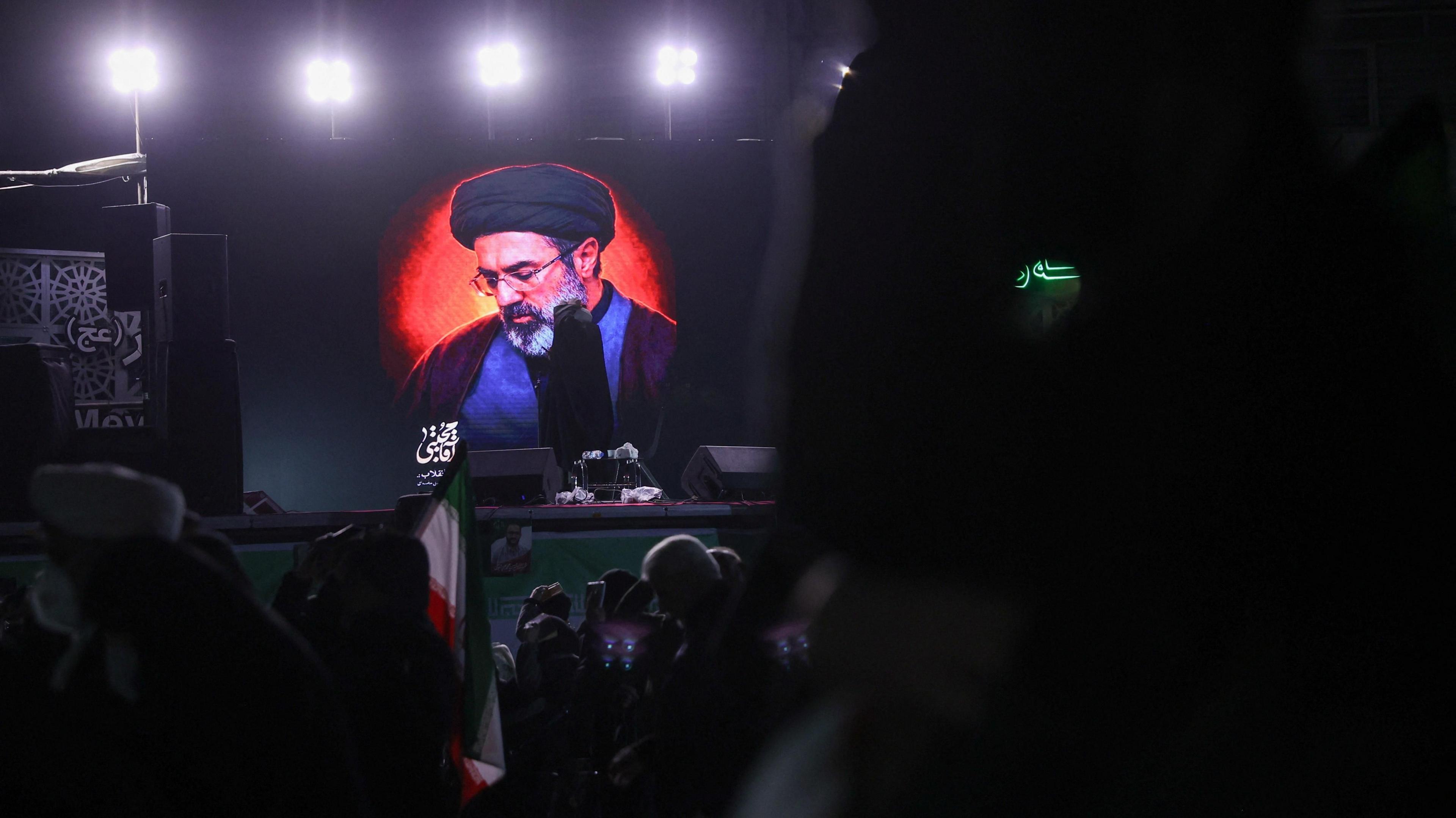 A picture of Iran's new supreme leader, Mojtaba Khamenei, is displayed on a screen in Tehran.