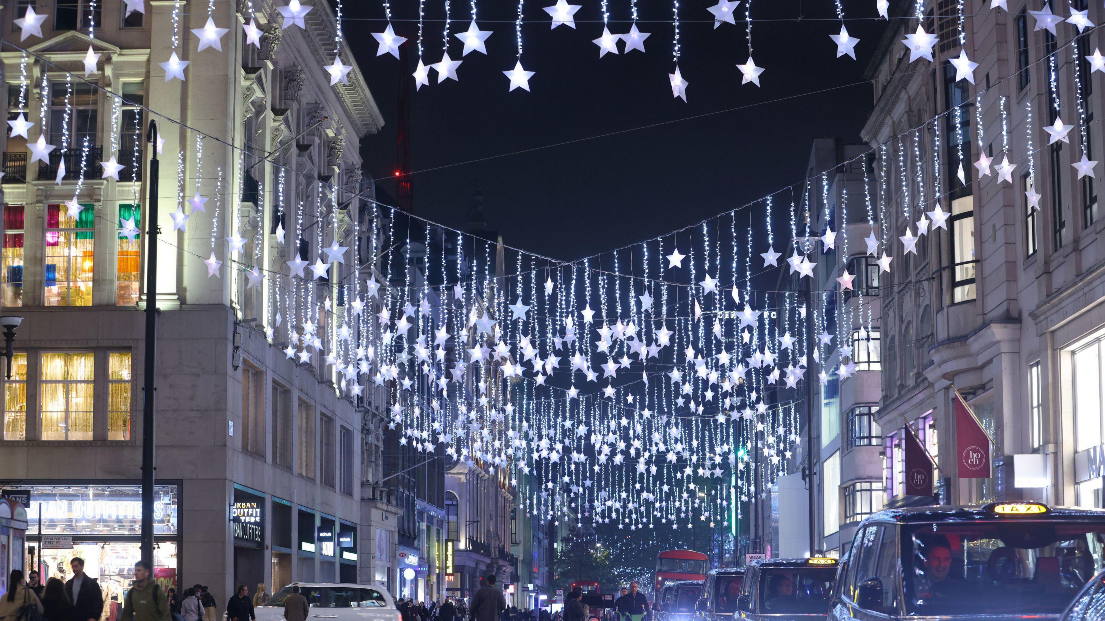 Oxford Street lights showing hundreds of slightly blue stars hanging across the street