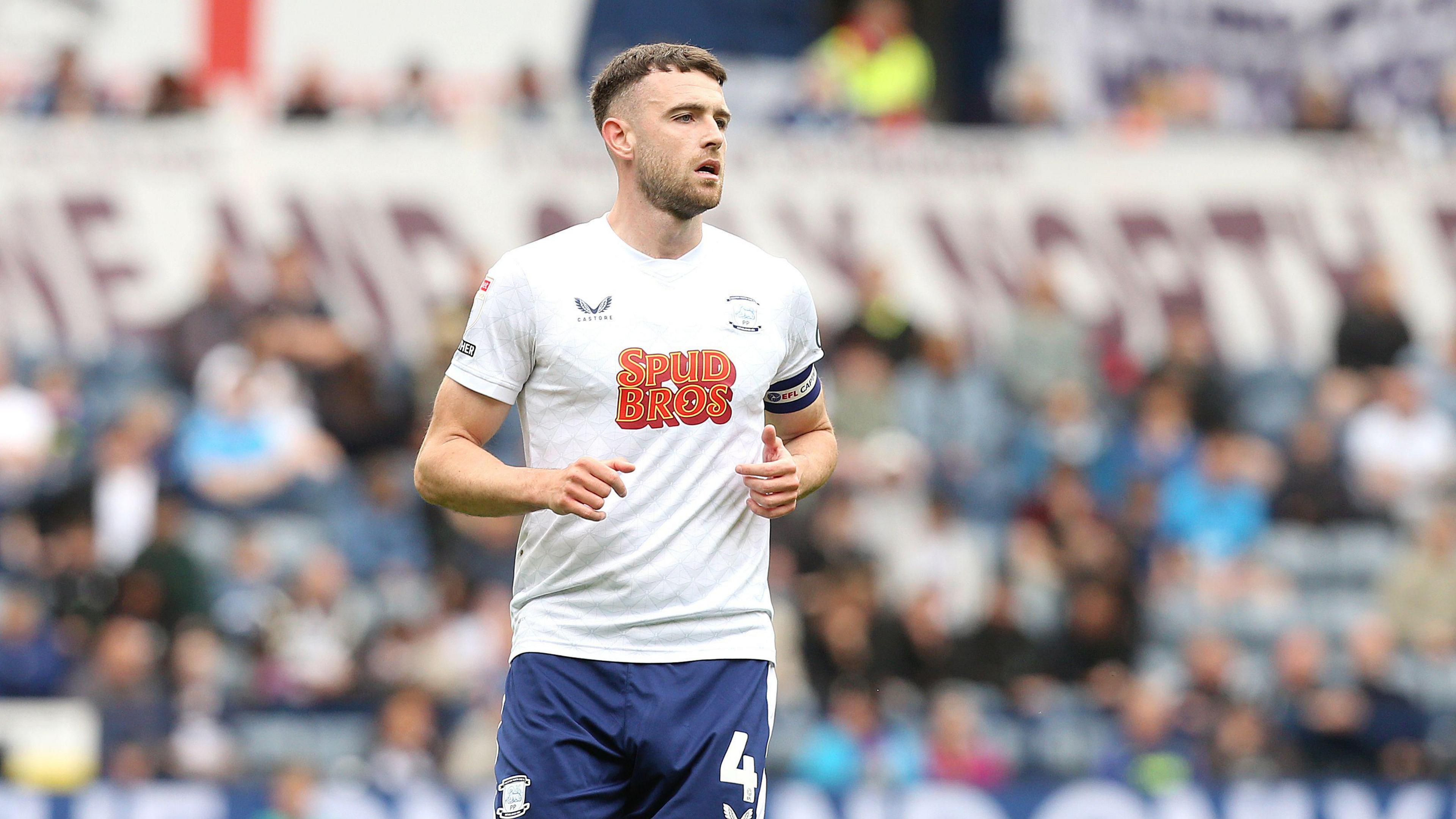 Ben Whiteman playing for Preston North End in his white and blue home kit