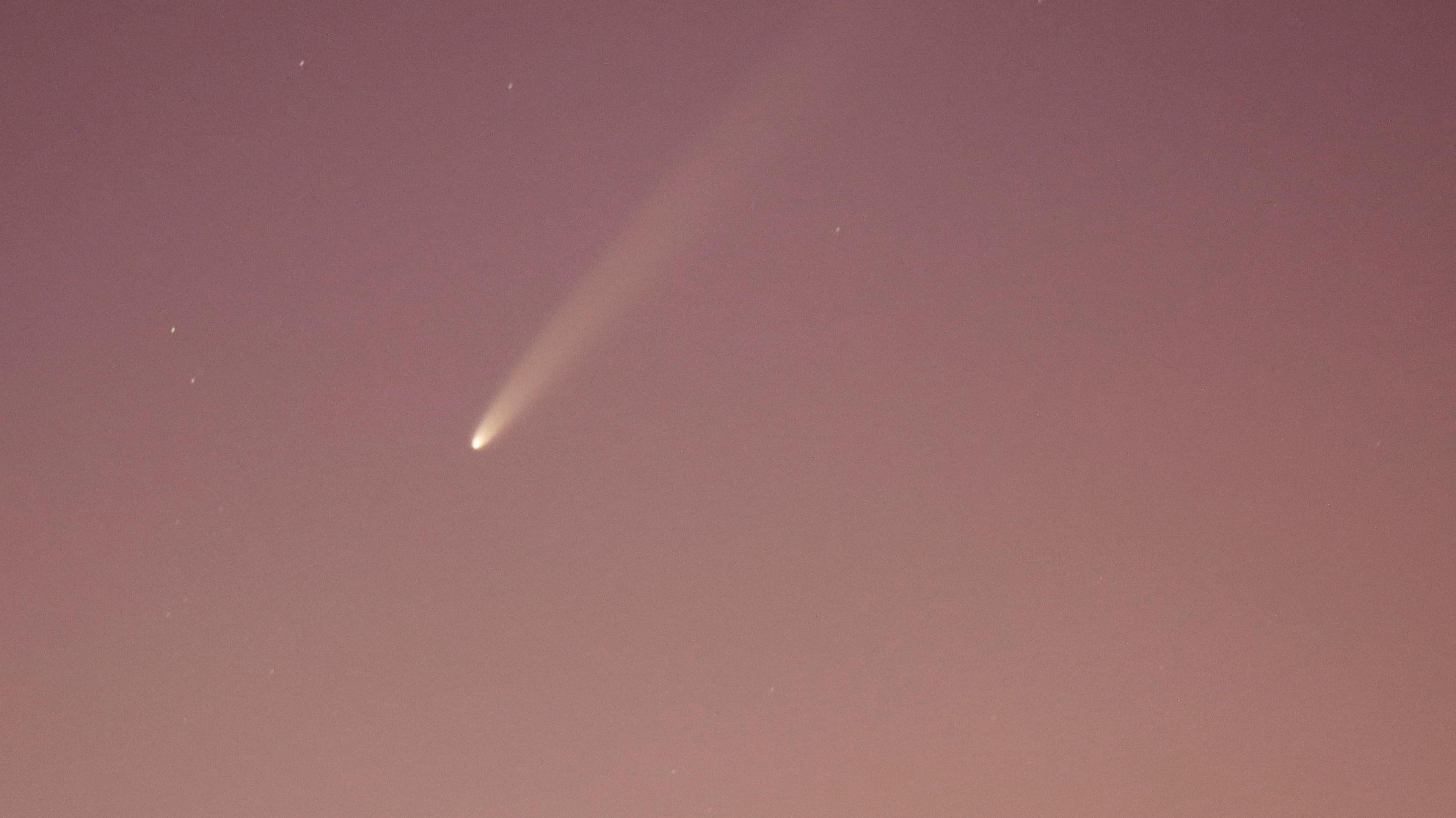 Comet going across the sky