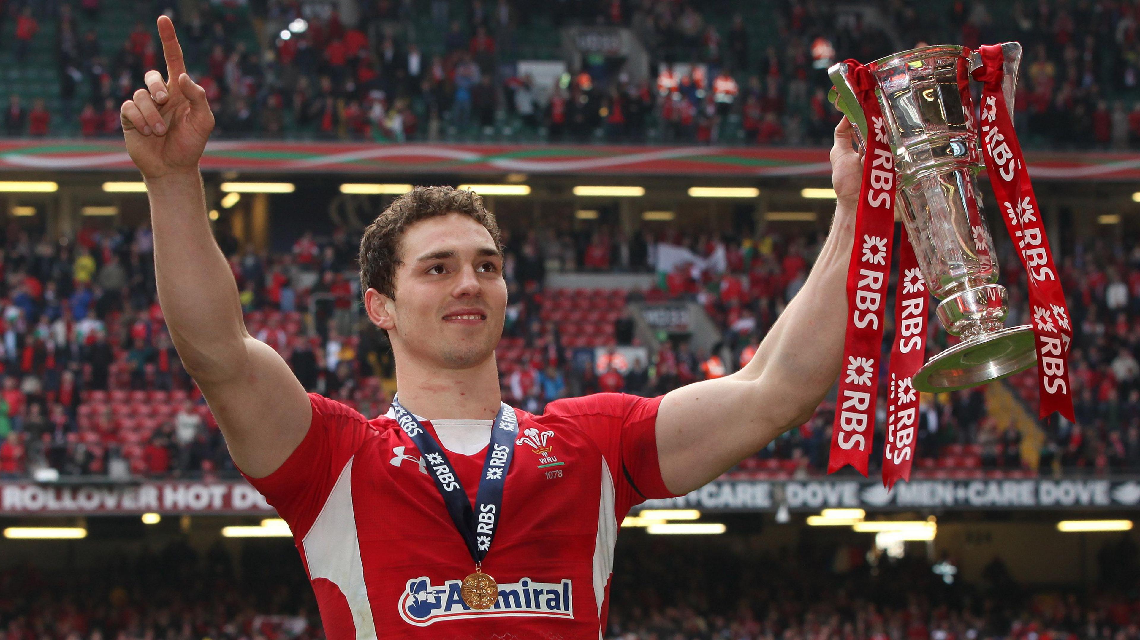George North holds the Six Nations trophy aloft in 2012