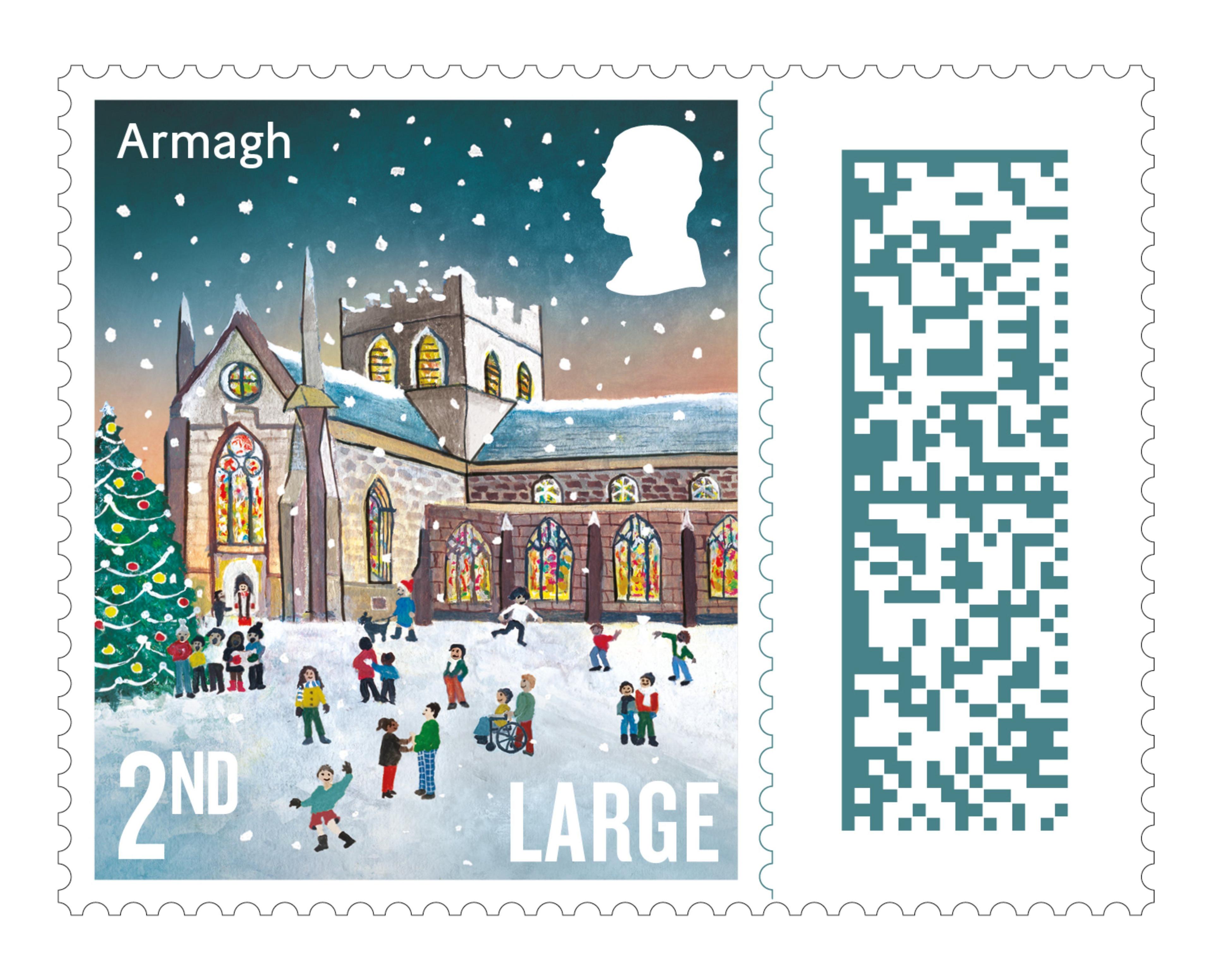 The stamp is an illustration of St Patrick's Cathedral with lots of children outside of it playing in the snow. The cathedral is covered in snow with the lights on and the sky has a dark sunset. It says "2nd Class Large" on it.