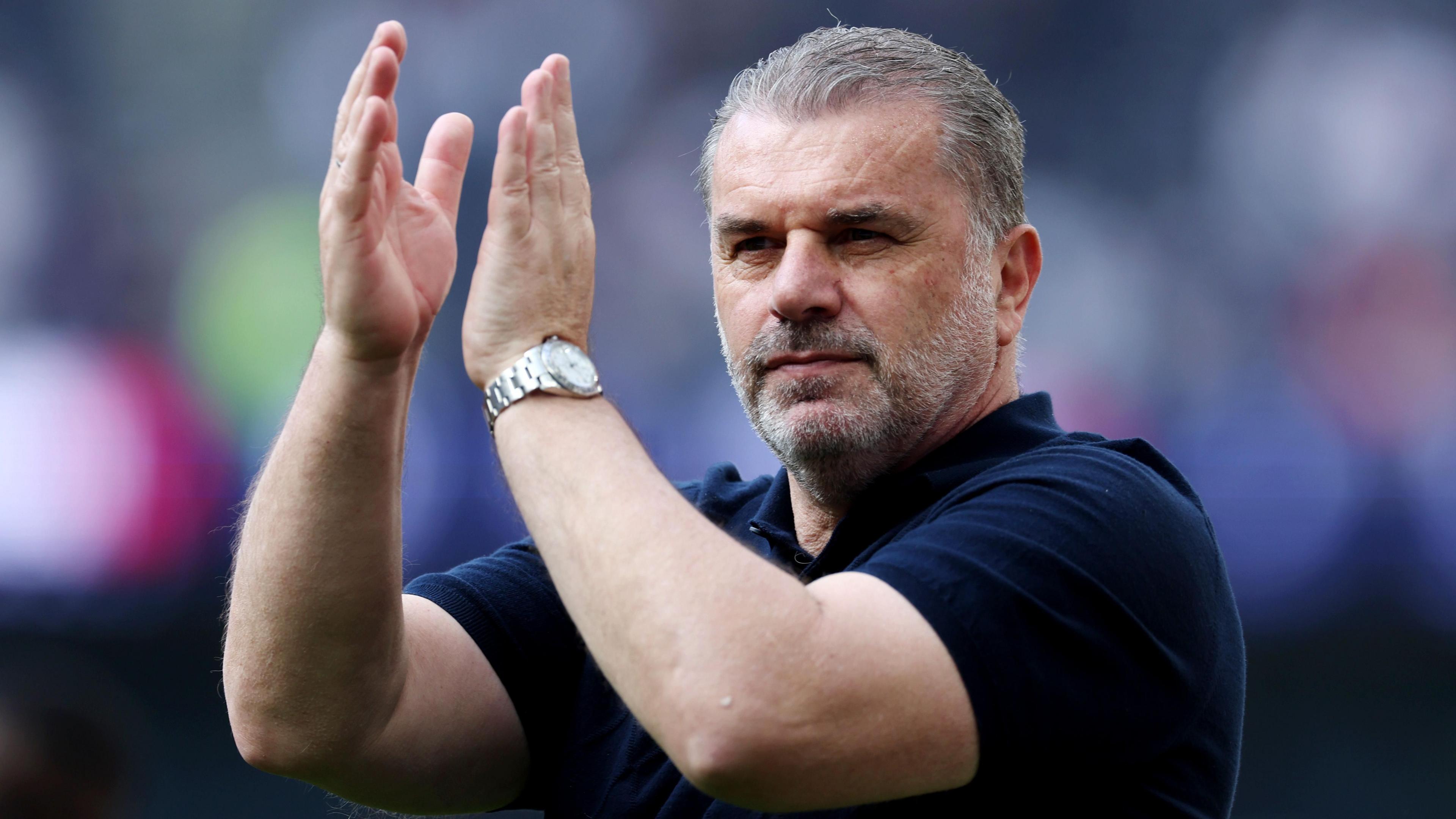 Ange Postecoglou claps the Tottenham fans