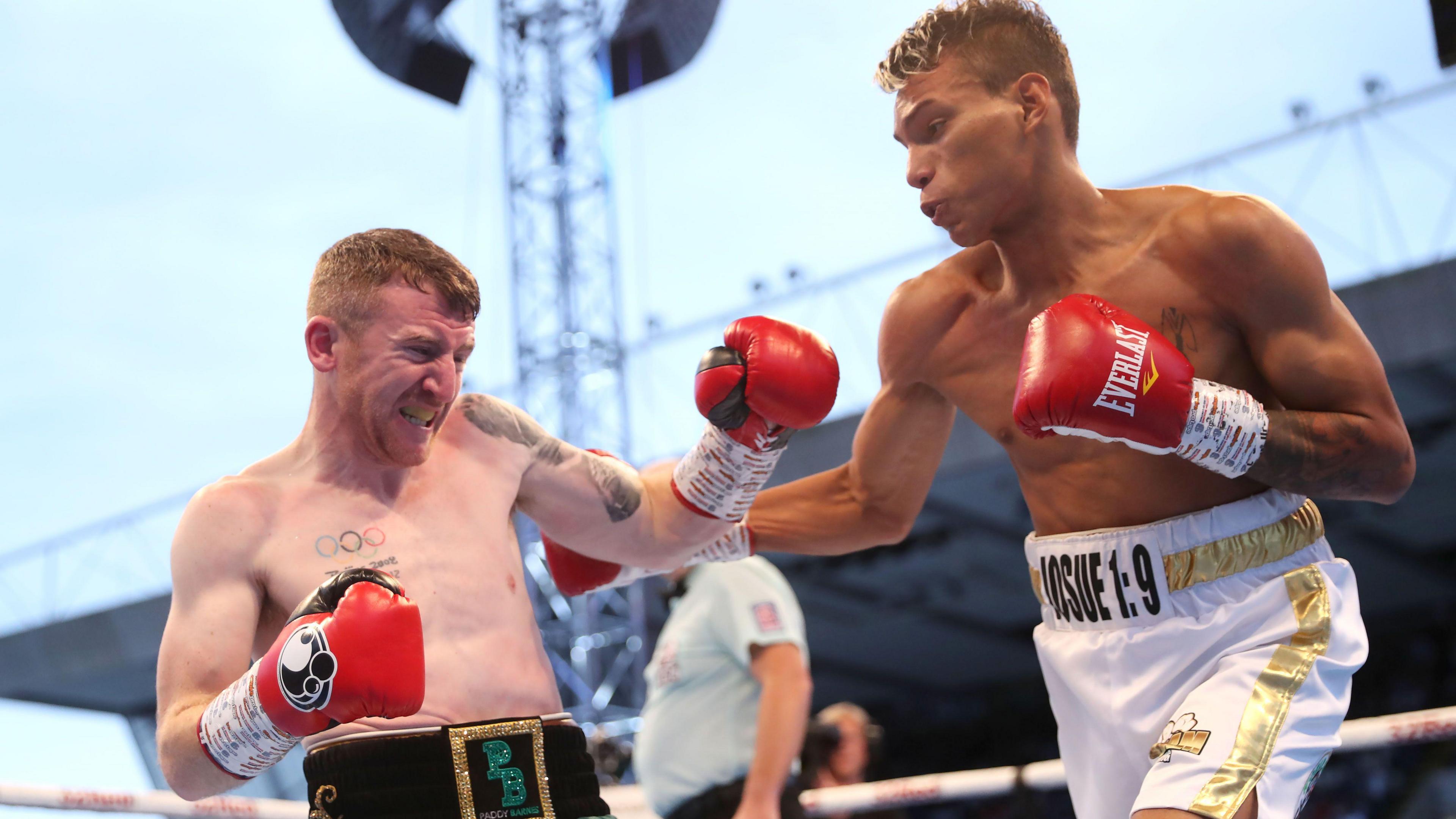 Cristofer Rosales lands a correct manus connected Paddy Barnes