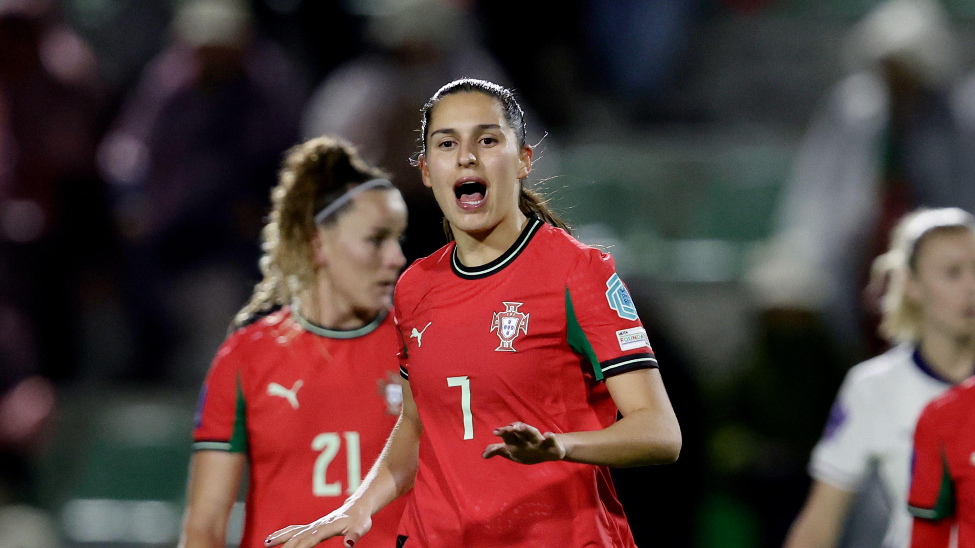 Kika Nazareth celebrates against England