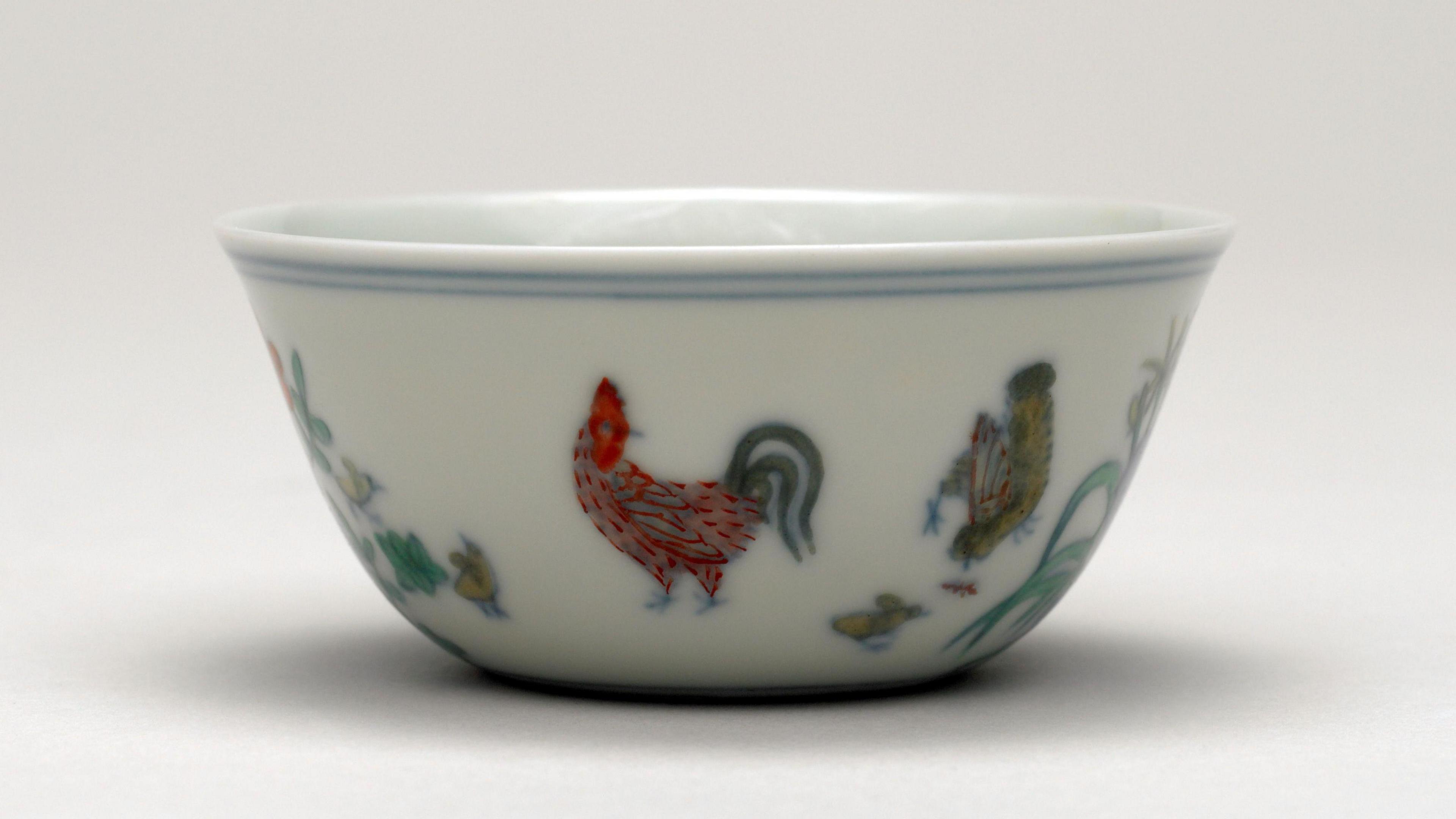 Small ceramic bowl with a chicken painted on the outside