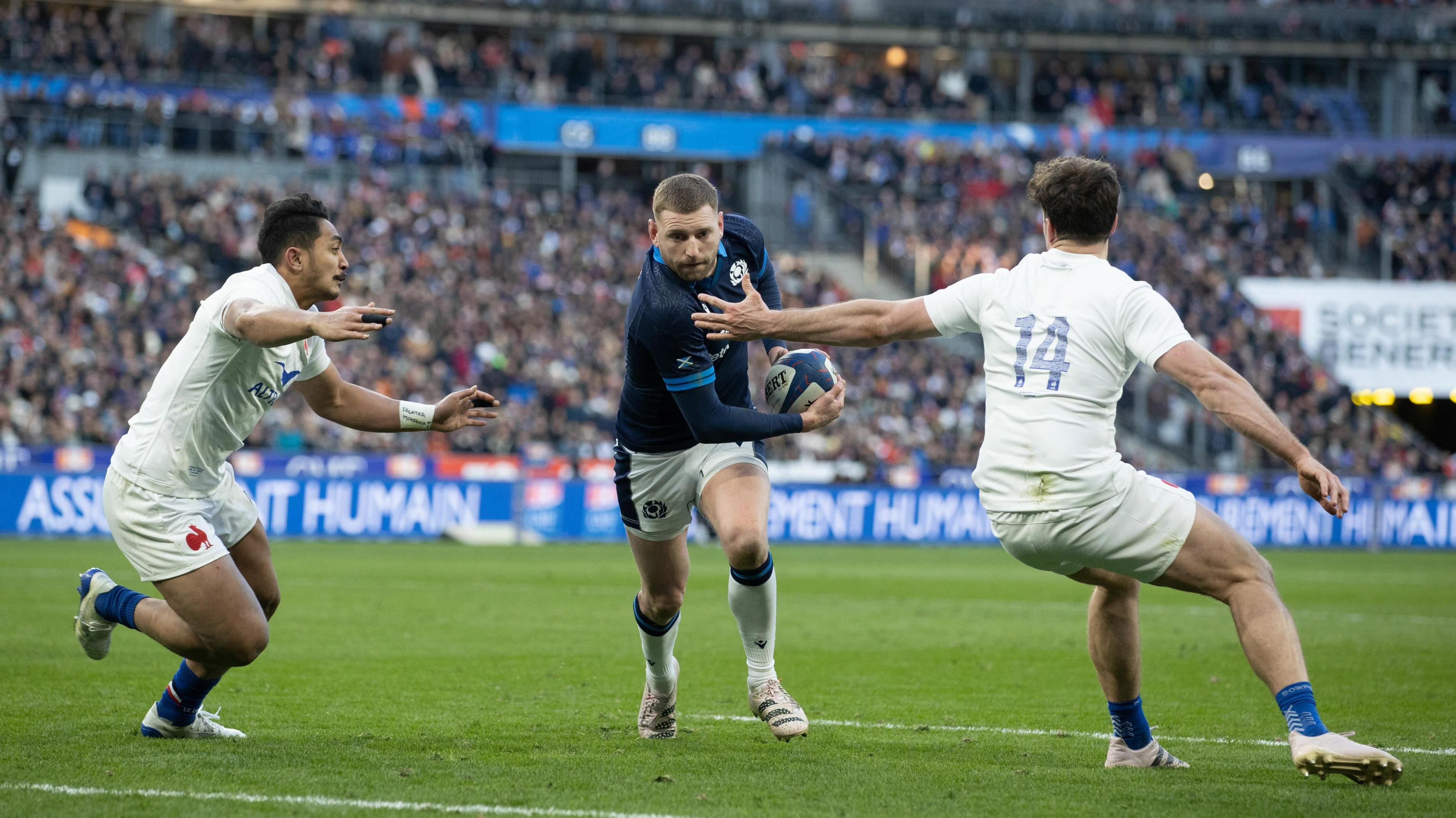 Scotland's Finn Russell scores a try against France