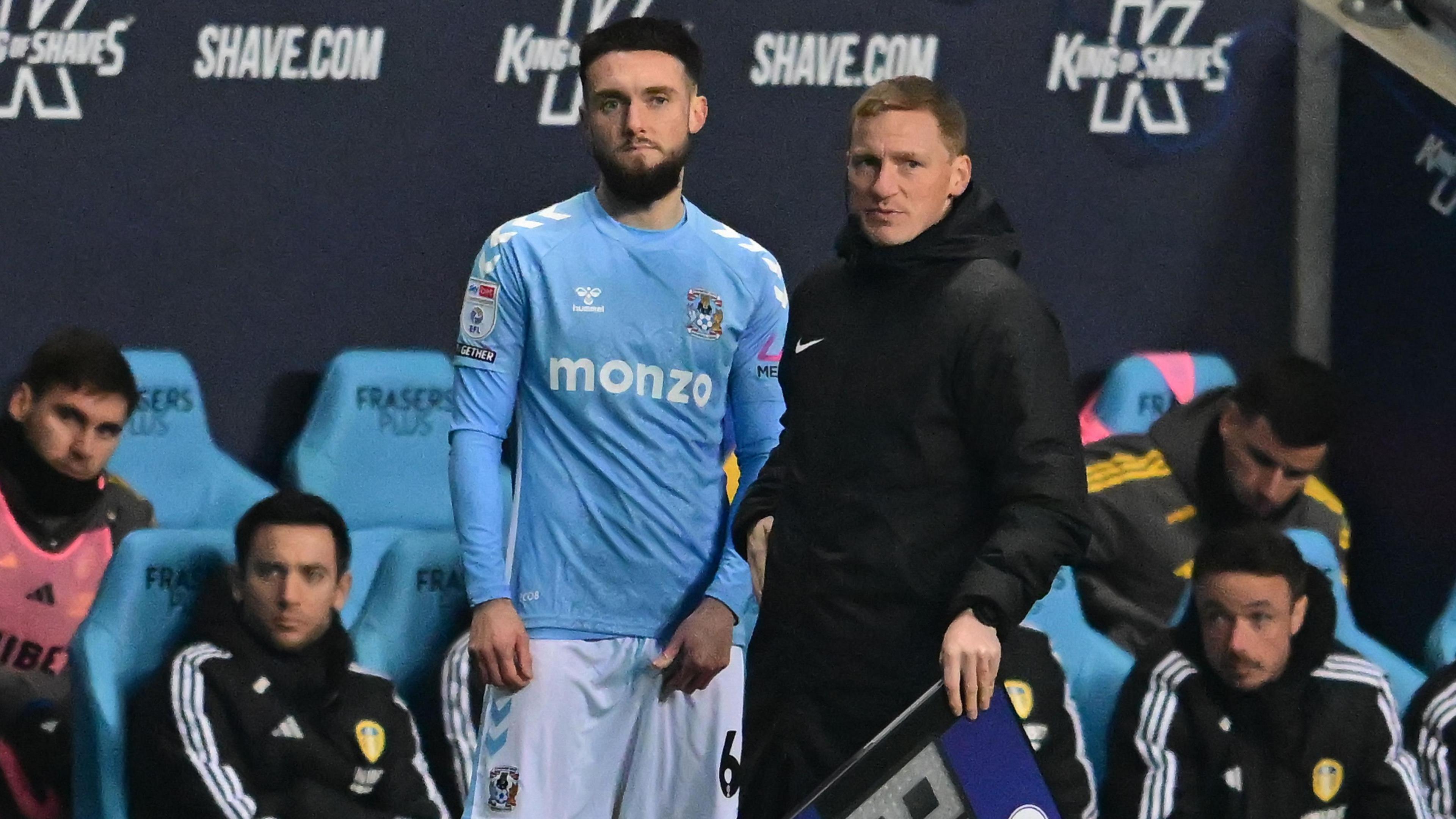 Matt Grimes waits to come on against Leeds