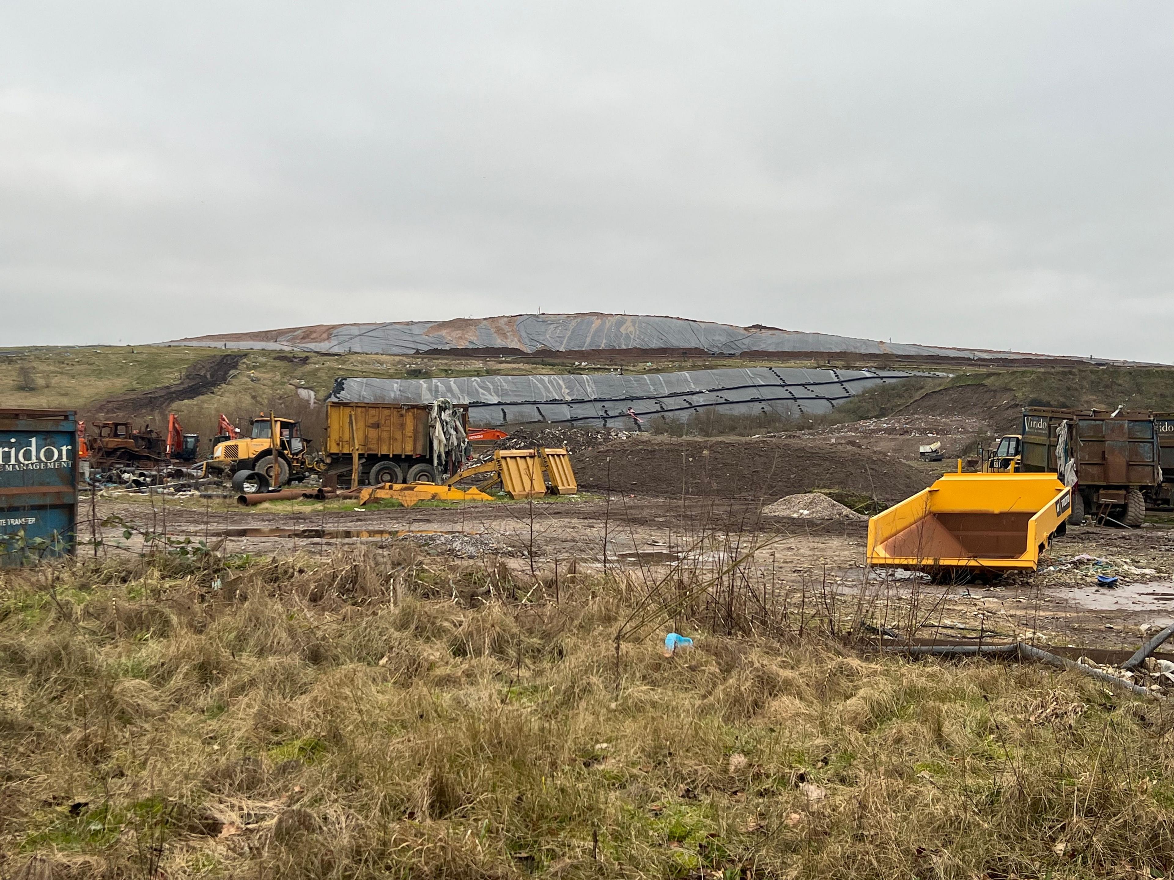 View of Pilsworth South Landfill with diggers in the foreground.