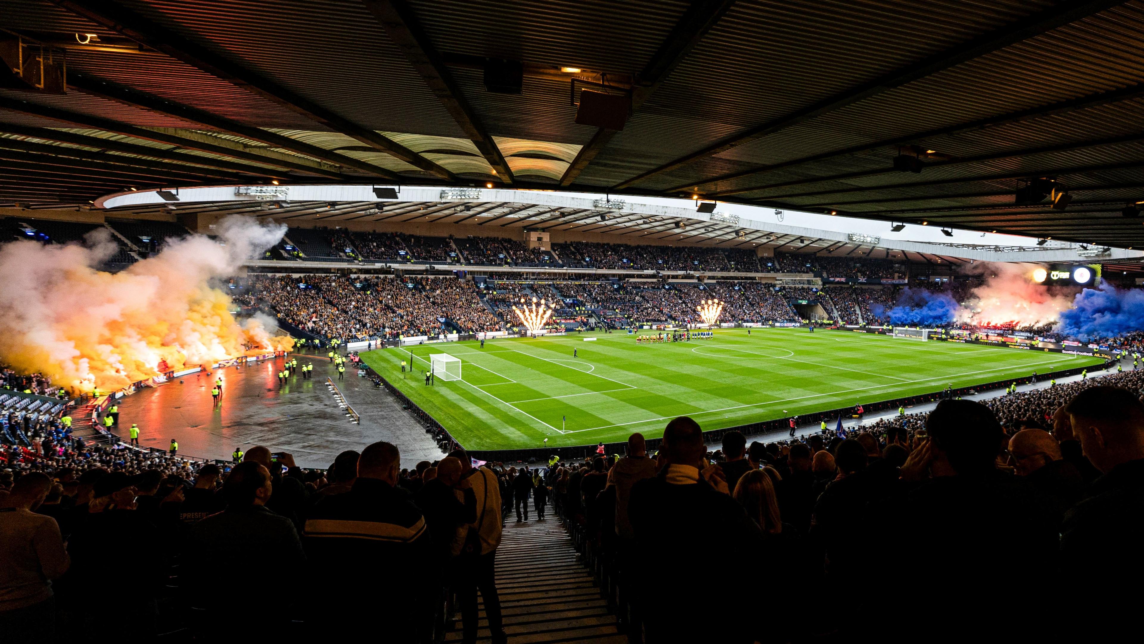 Motherwell and Rangers fans set off pyrotechnics at Hampden