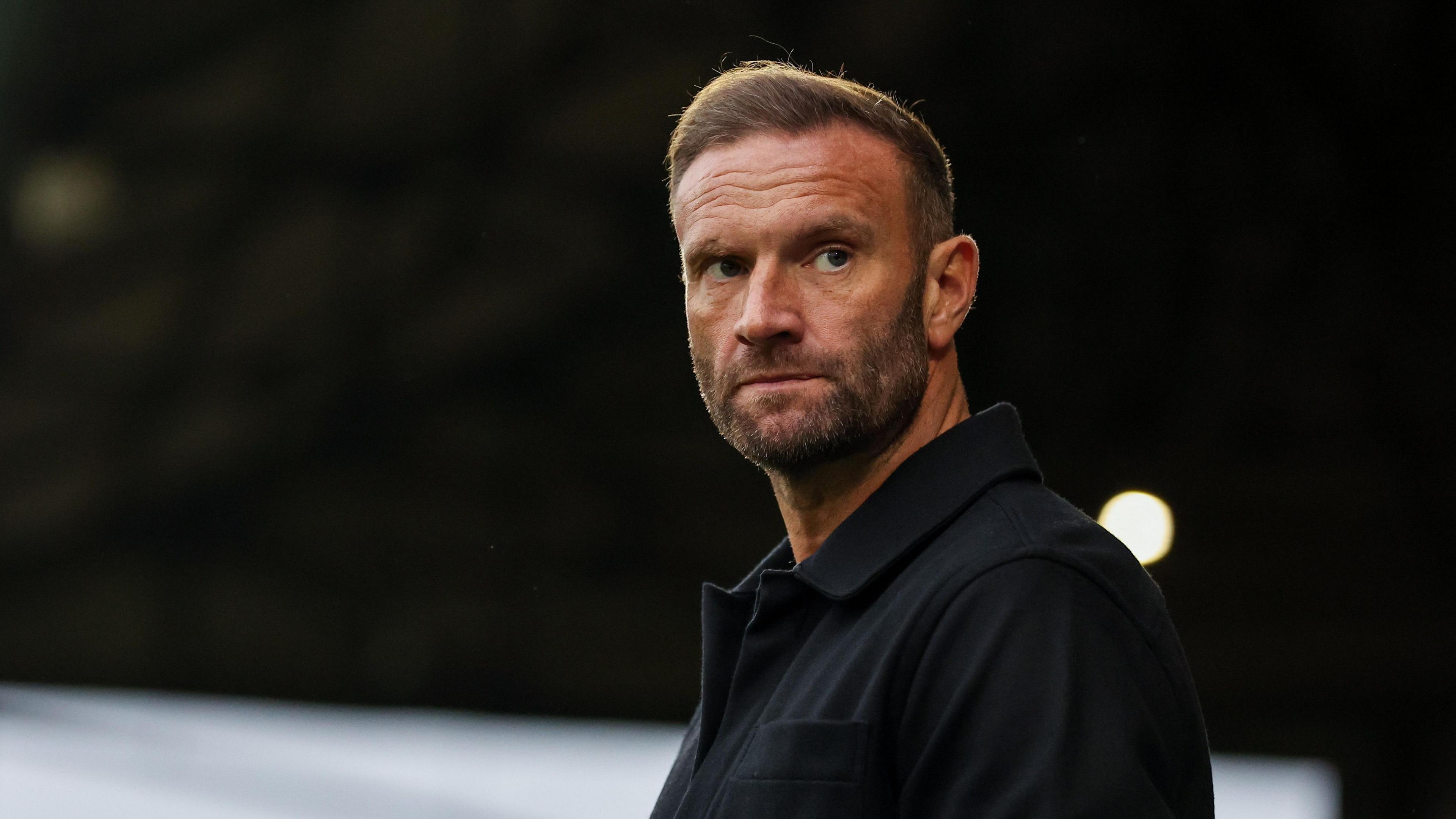 Ian Evatt looks on during his time in charge of Bolton Wanderers
