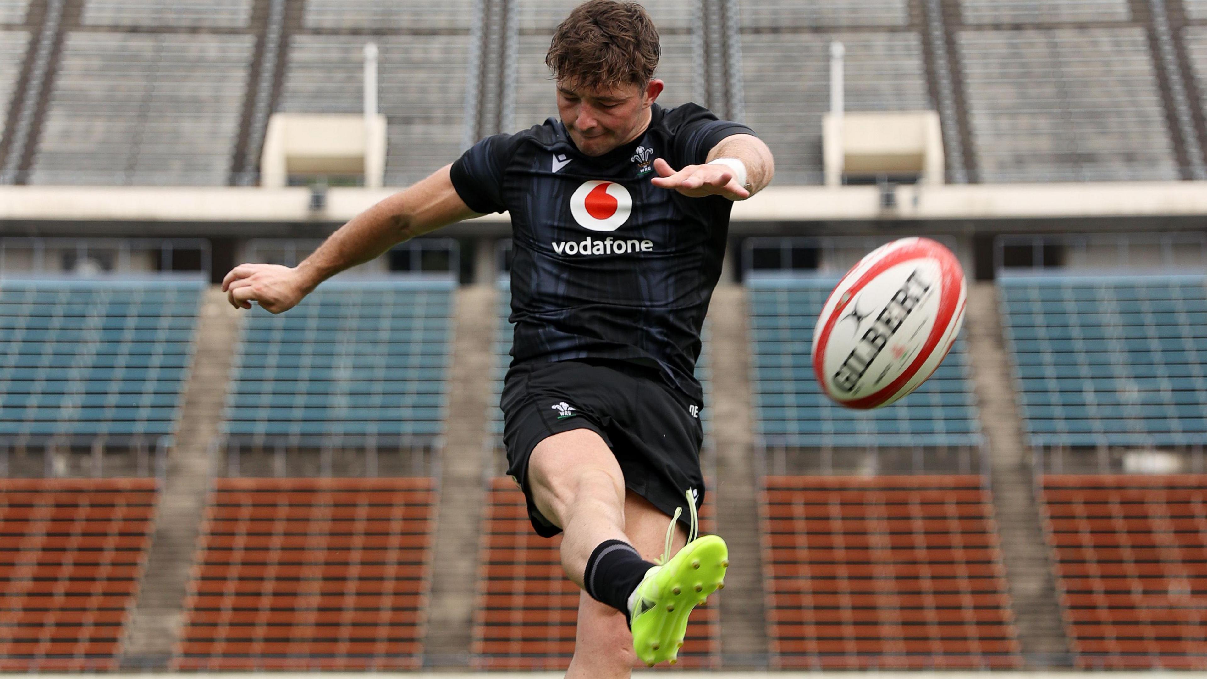 Dan Edwards kicking during training