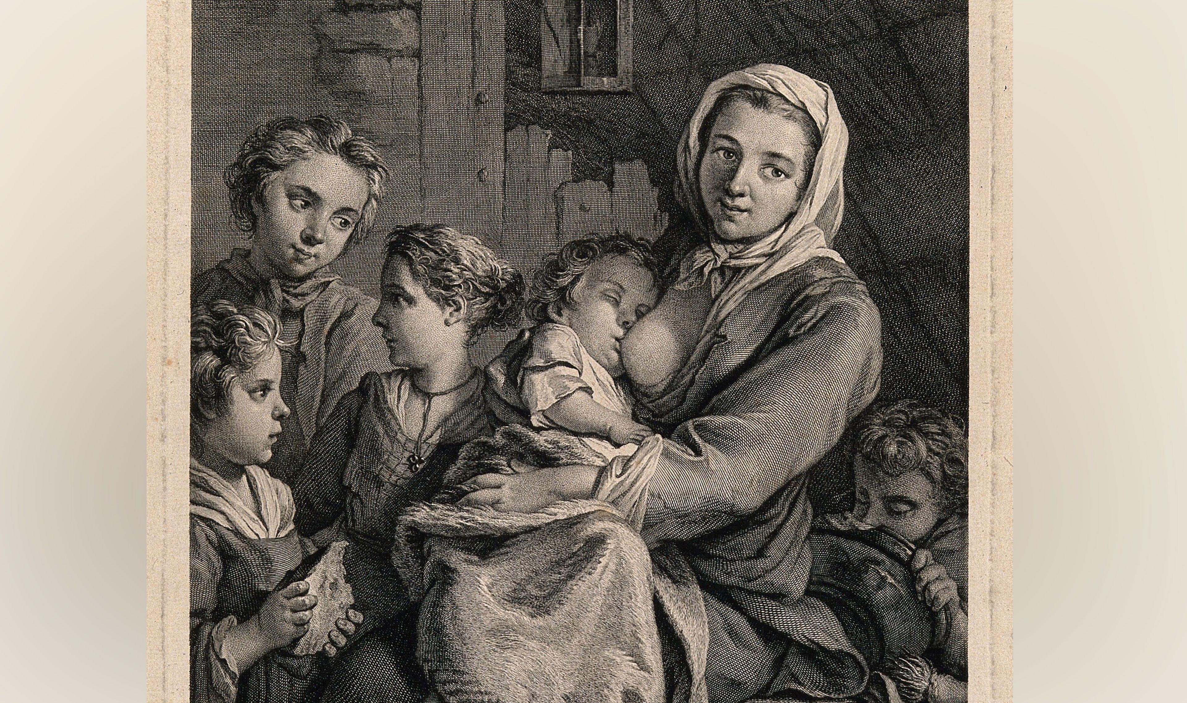 An engraving in black of a woman breast feeding a baby with four other children gathered around her, by N de Larmessin III after Jean-Baptiste Marie Pierre